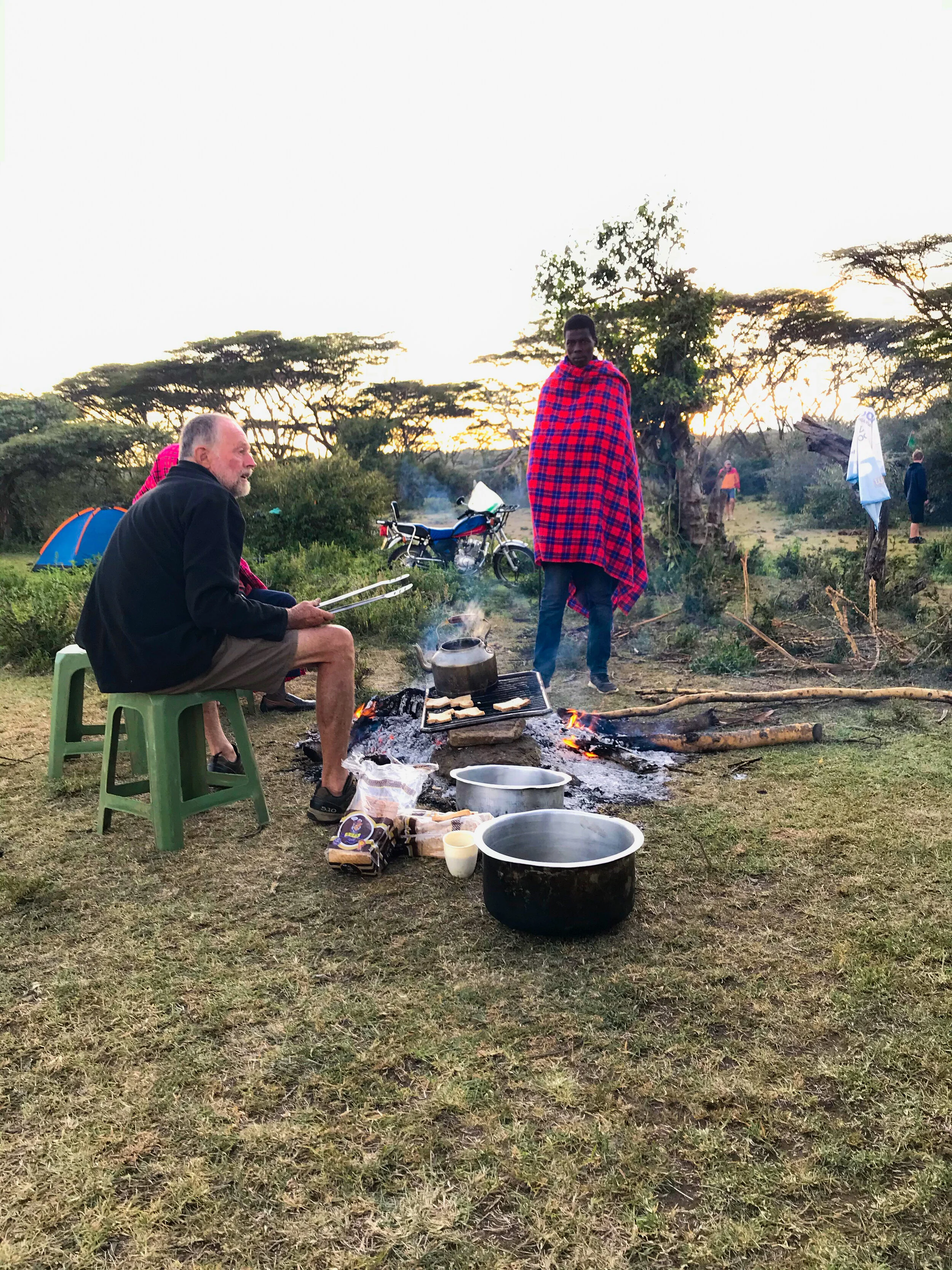  Mark making toast.  I don’t know what joy those who sleep-in are gaining during the trip since they’re missing the first hour of the day with this Kenyan legend.   