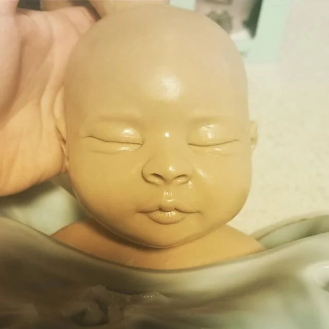 New Emma being pulled from the mold! This one is poured in my ethnic coloring. I'm so excited to paint her! I believe I will also be rooting her. I'm looking forward to seeing Emma with a cute little mop of hair for the first time! *She is Emma #8 an