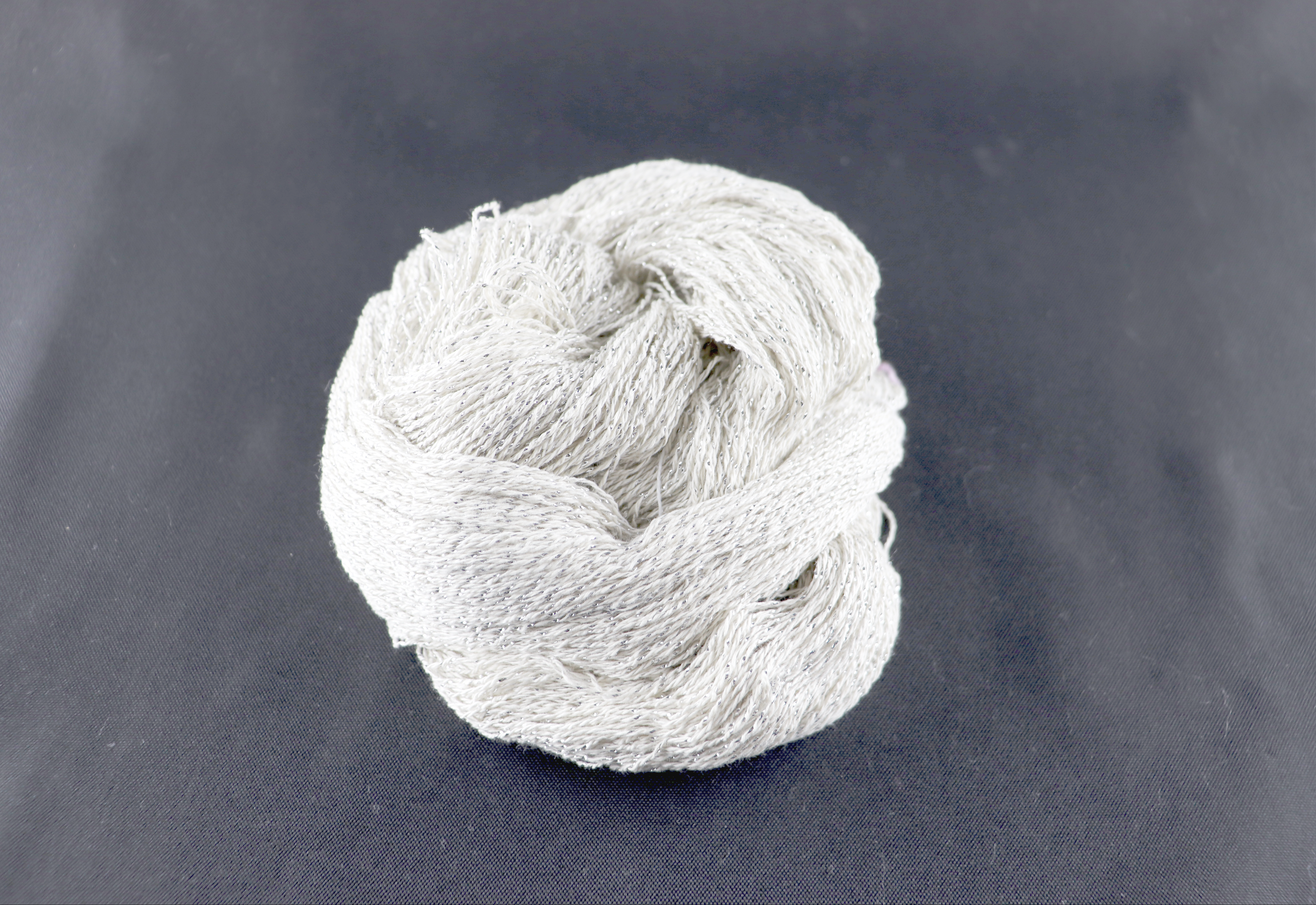 Carded cotton silver sparkle filament.png
