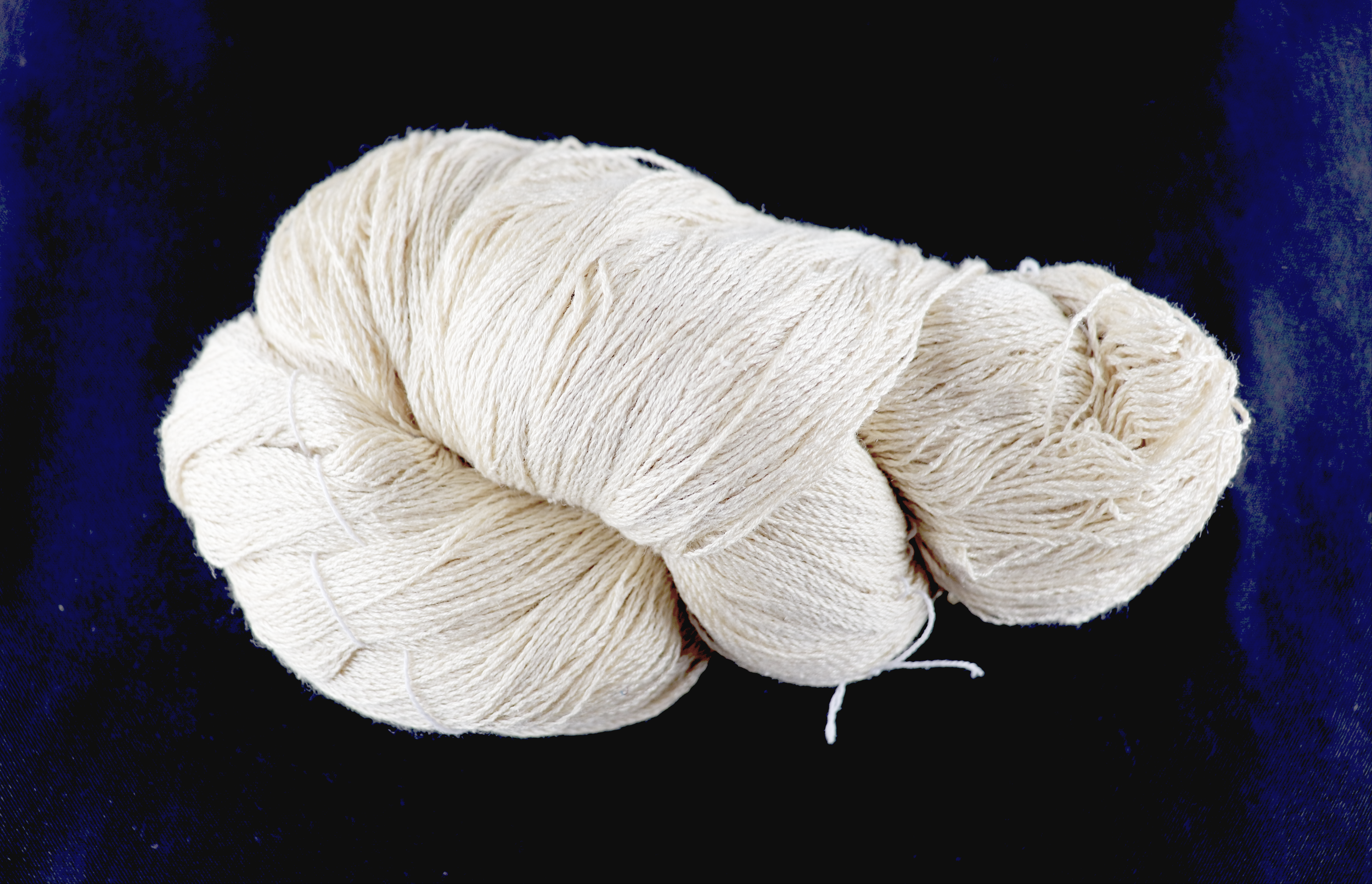 Textured – 100% eri silk, also known as peace silk or ahimsa silk. The softness of this yarn is unreal. Lends a butter-soft, ace-bandage, subtly textured quality to woven items. Comes on skeins of variable sizes