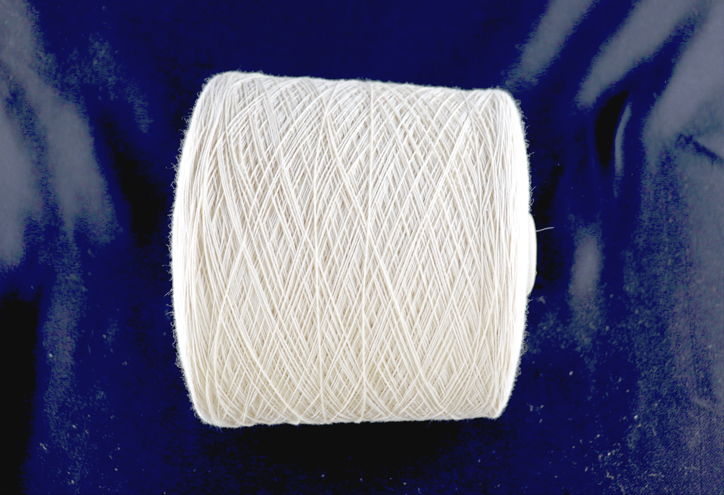 Supima cotton. 16/4ne lace weight. On cones of approx. 3.625lb. 3360ypp (equivalent to 8/2ne cotton). Probably my favorite cotton ever. $35/lb