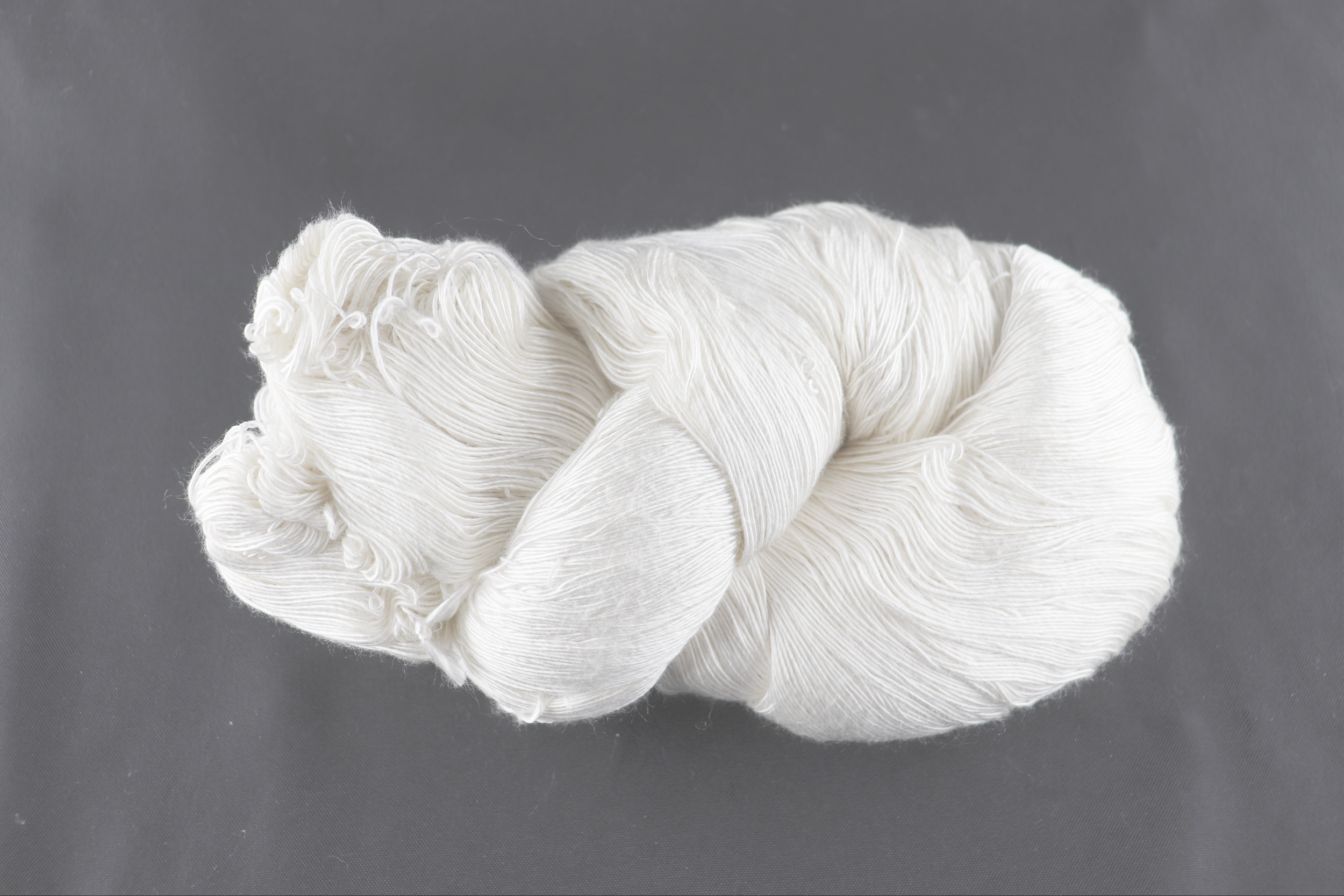 Spun Luxe Silk 4/1 nm. So soft and dyes beautifully. $100 / lb