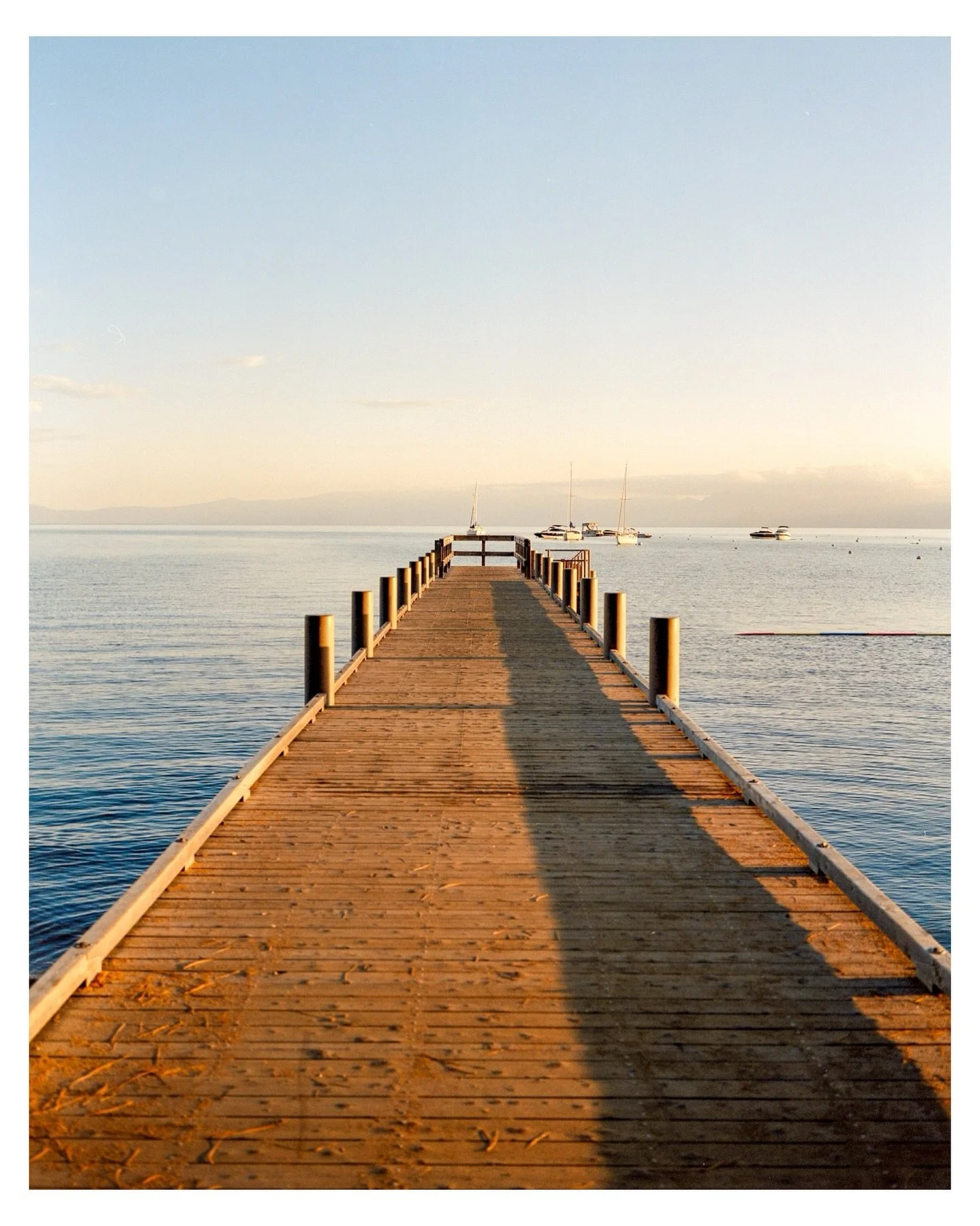 The dock turned gold just as the sun rose over the mountains π
 
π·: Mamiya 7β¨ποΈ: Kodak Portra 400β¨π§ͺ: @mirasfilmlab
#filmphotography #shotonfilm #mediumformat #analogphotography #laketahoe #norcal #mamiya7 #kodakportra400