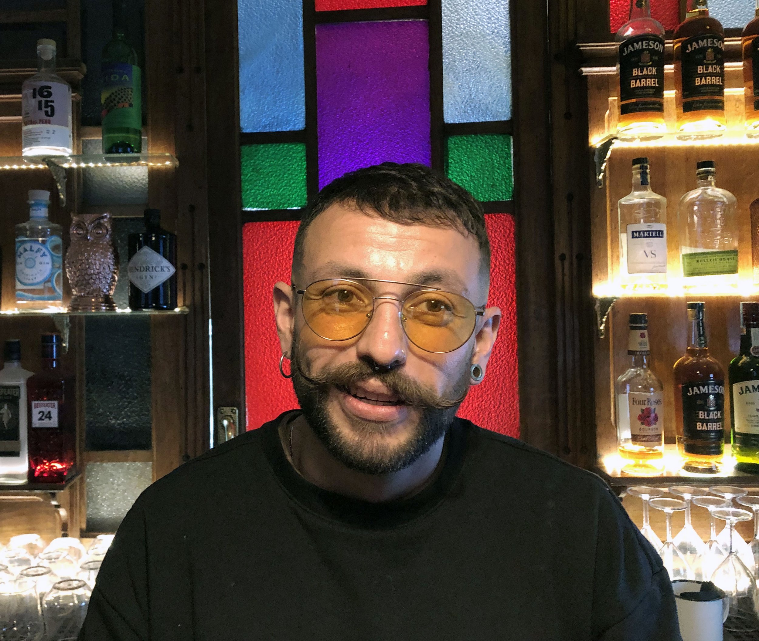 Mario, barkeep at A Tabacara, a small cocktails and oyster bar in a former tobacco shop in Lisbon’s Cais do Sodré neighborhood.
