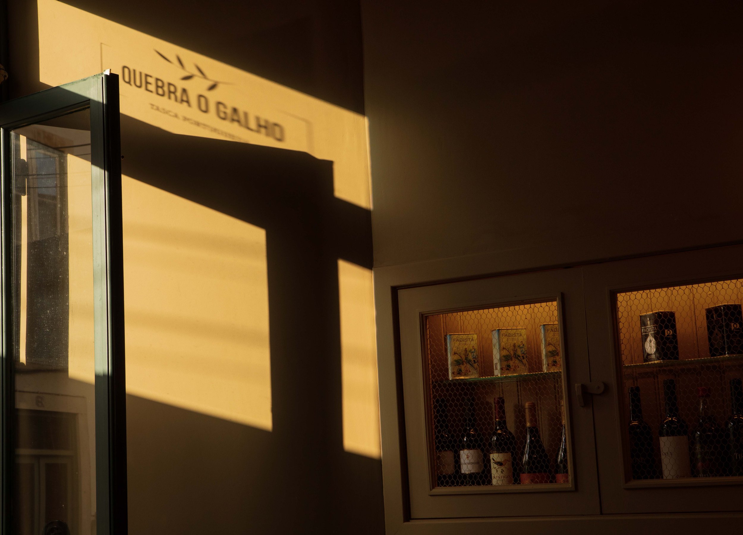 Quebra O Galho, an intimate tavern/small-plates venue in Coimbra with nightly fado performances.
