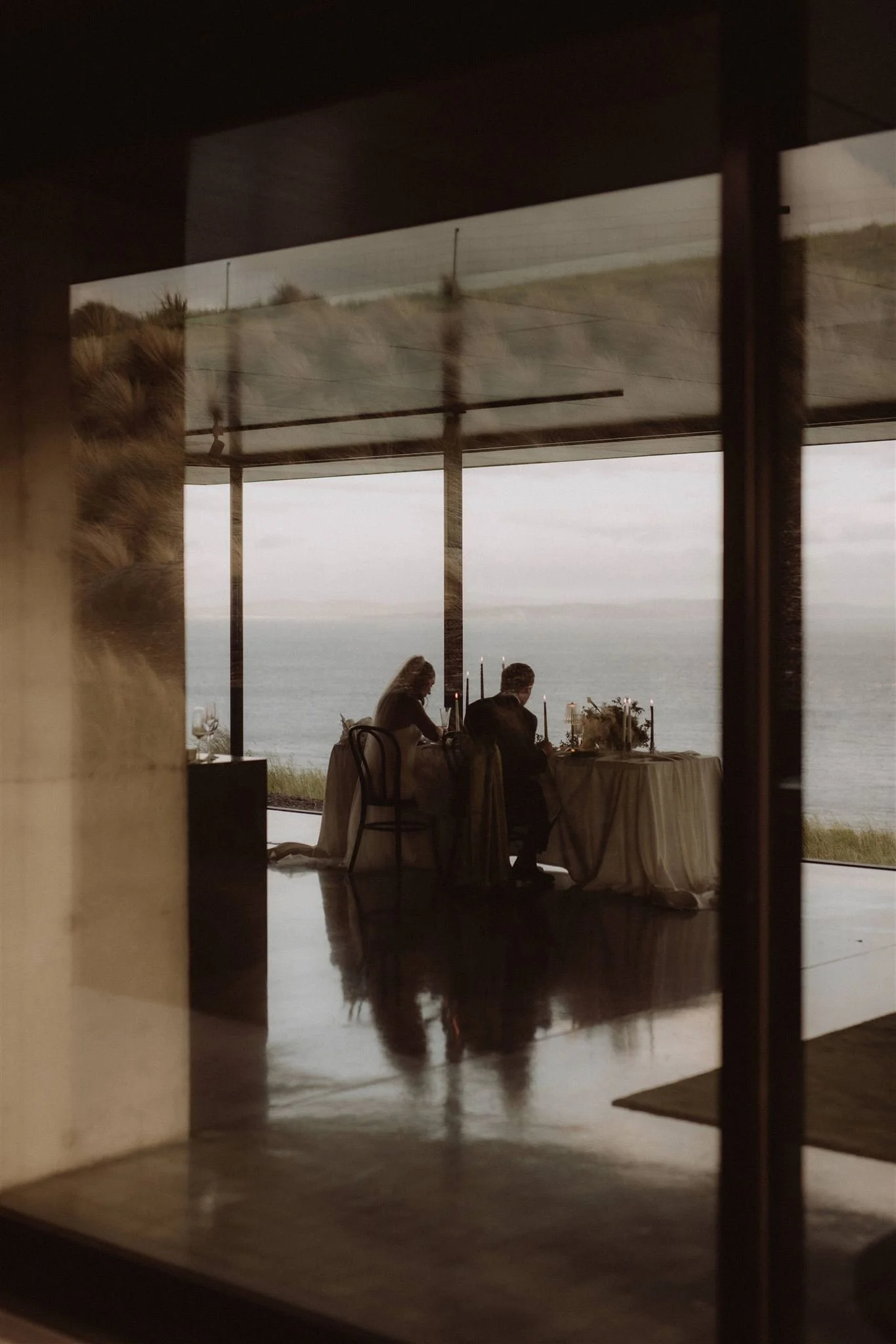 bride and groom eating dinner at the point in tasmania