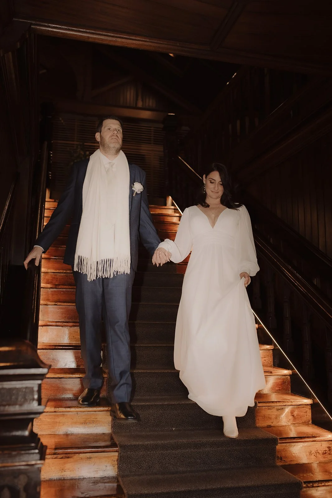 photo of bride and groom on stairs at Henry Jones Hotel