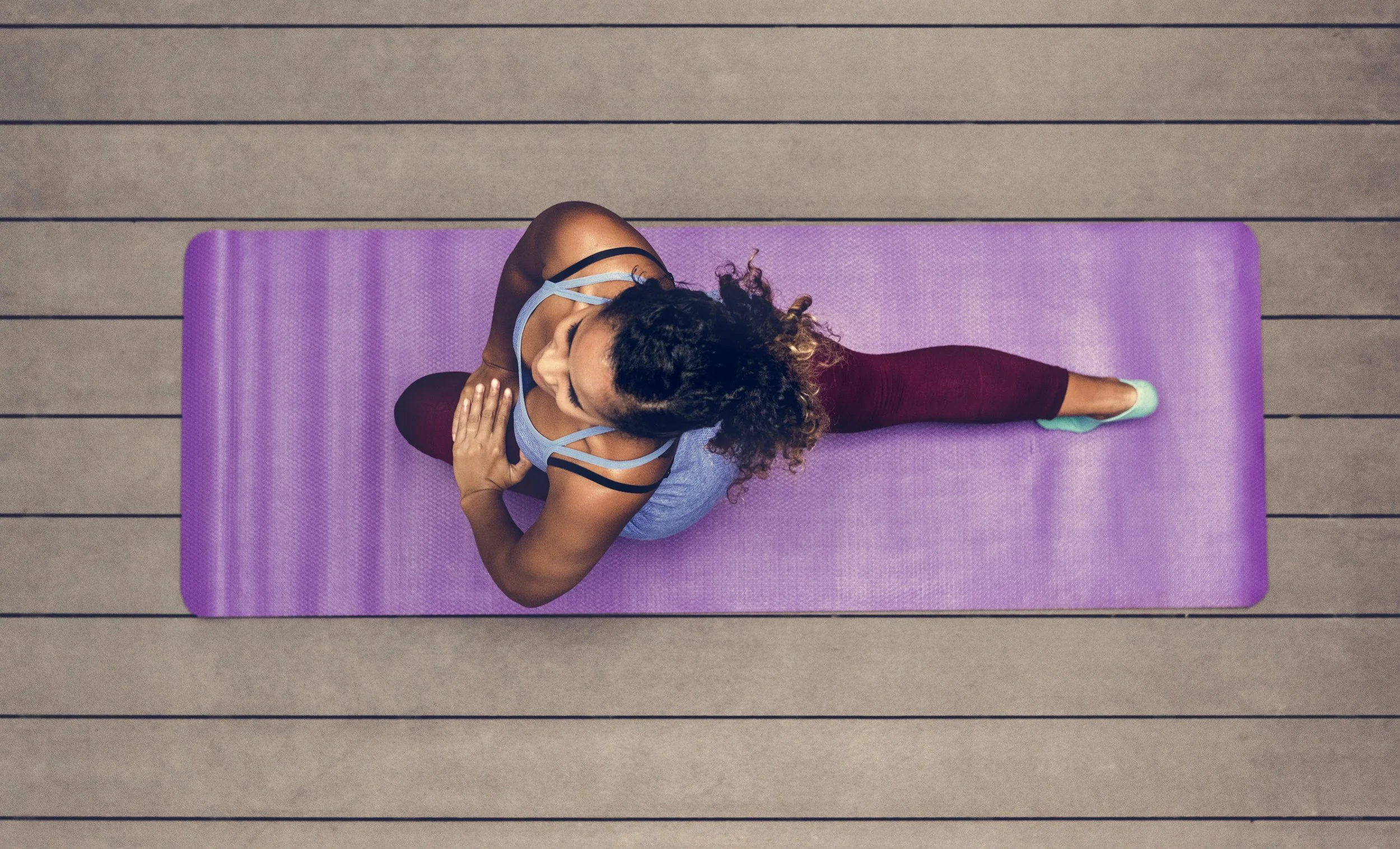 healthy-woman-doing-yoga-PTLXMDG.jpg