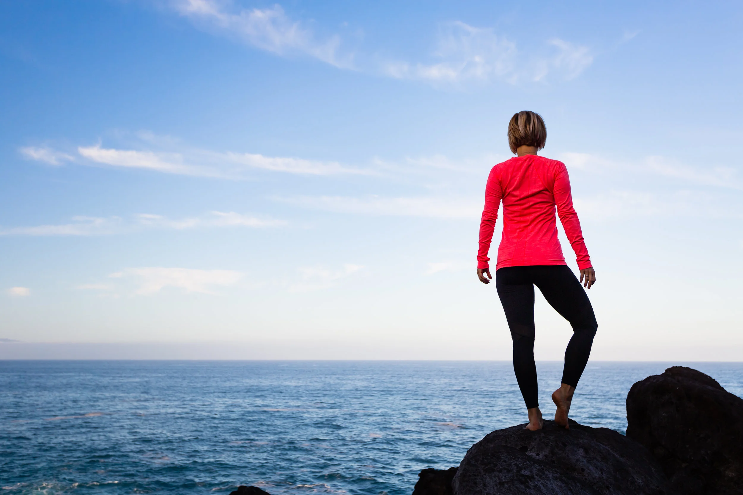 woman-meditating-in-yoga-vrksasana-tree-pose-P7EYM9Z.jpg