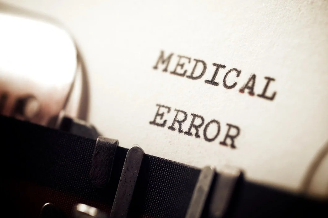 Medical error phrase written with a typewriter.