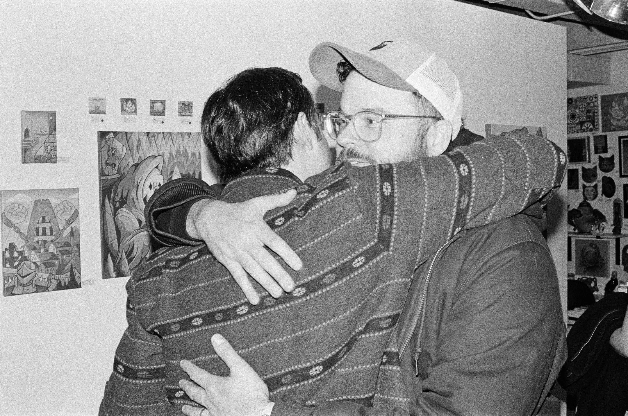 Hugs and art at Ergo Gallery during the January art walk! Film photos by Mack Greene @no_tiffs (thank you!). #seattleartists #artgallery #artwalk #seattlegallery #artexhibition #community