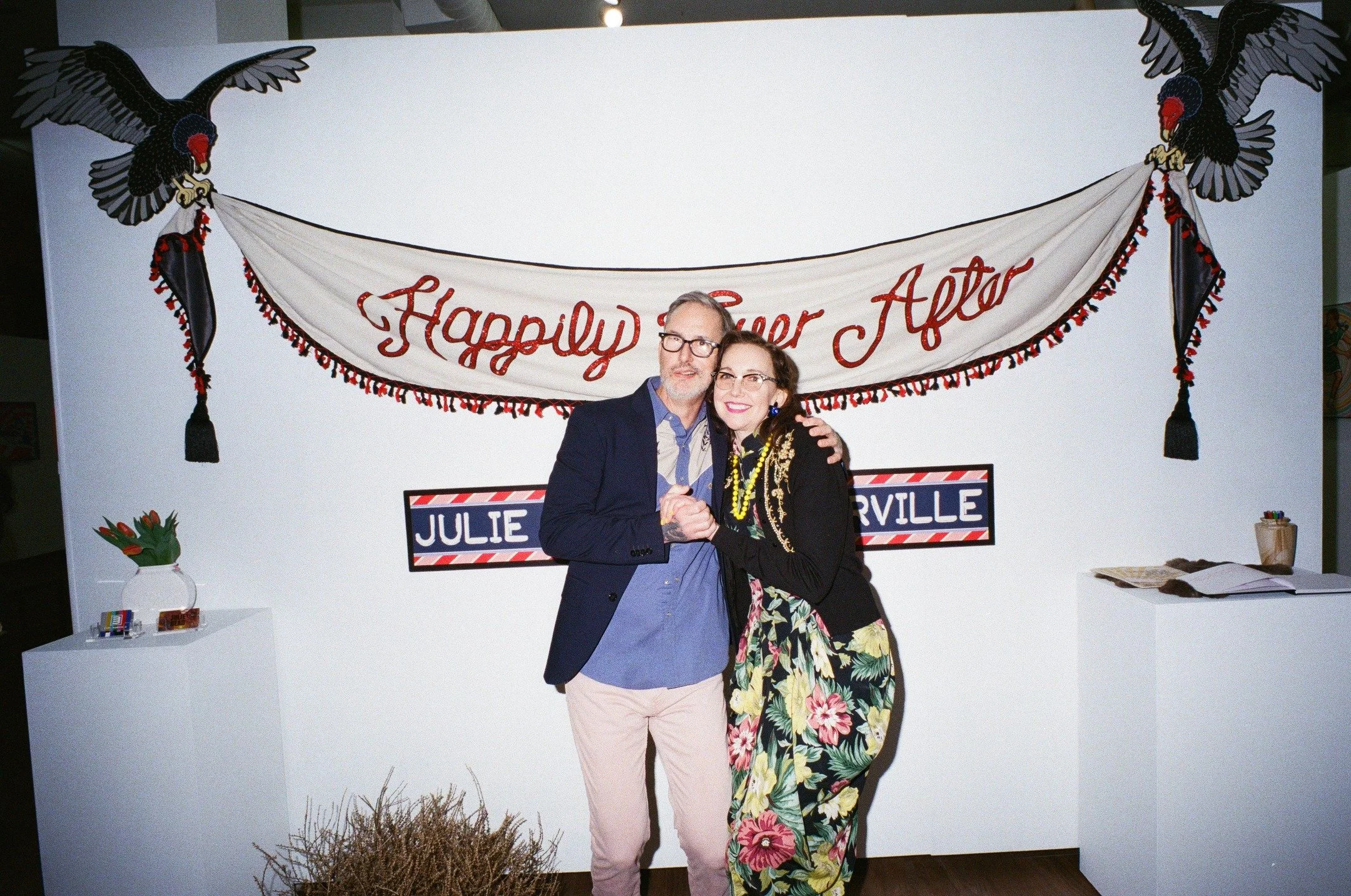 "Happily Ever After" exhibit at Slip during the opening night, featuring the art of Port Townsend newlyweds @burl.norville.art and @juliejuliereadread. Go see the show, up through April 4th! Thanks for the awesome film photos, @no_tiffs 🔥 