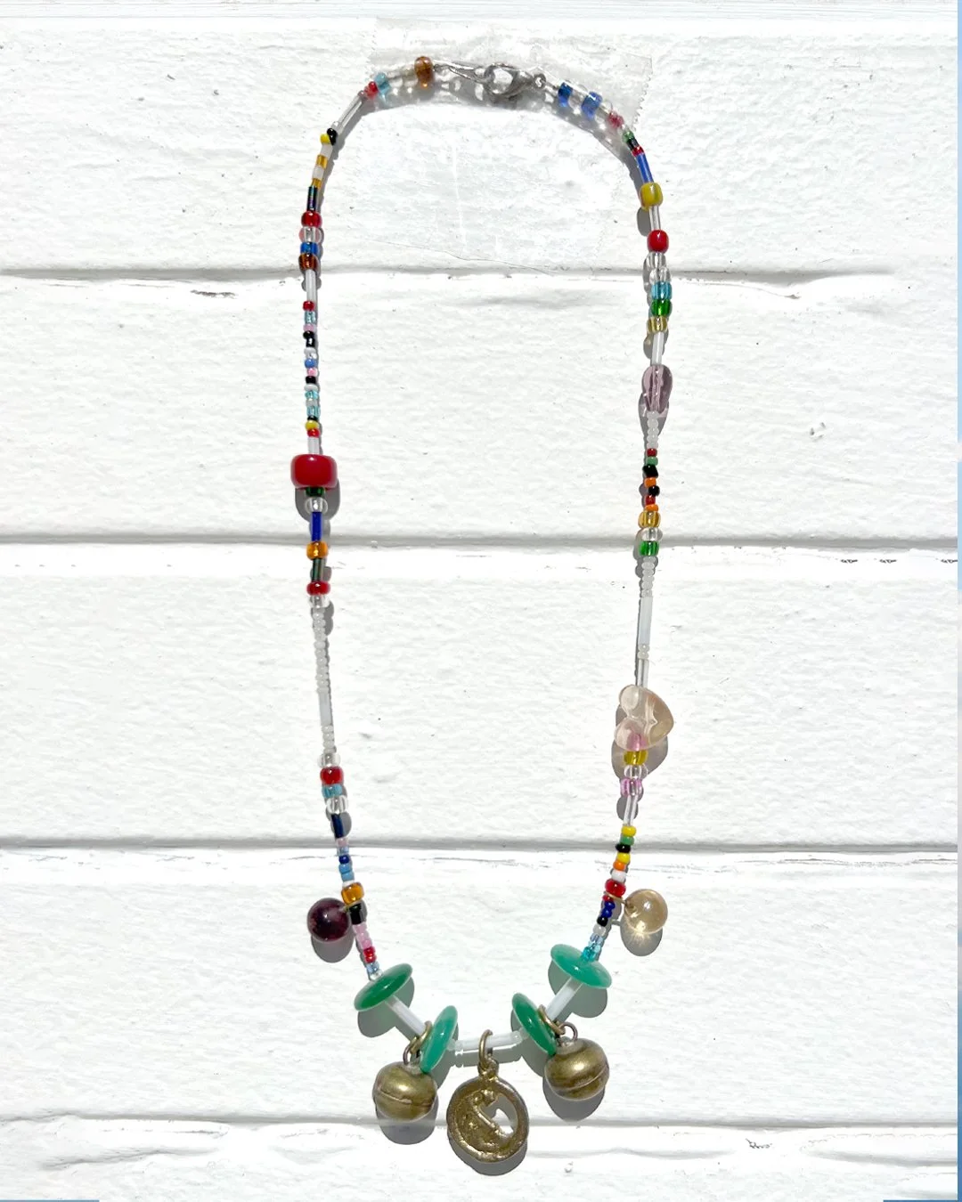 SHORT_CRESCENT AMULET 2 BELL NECKLACE-1.jpg