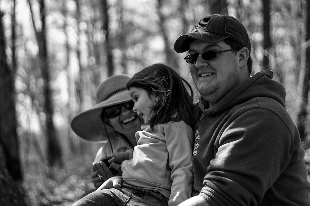 These parents totally dote over their little girl; it was so sweet to watch during their outdoor family documentary session near Oxford, MS.