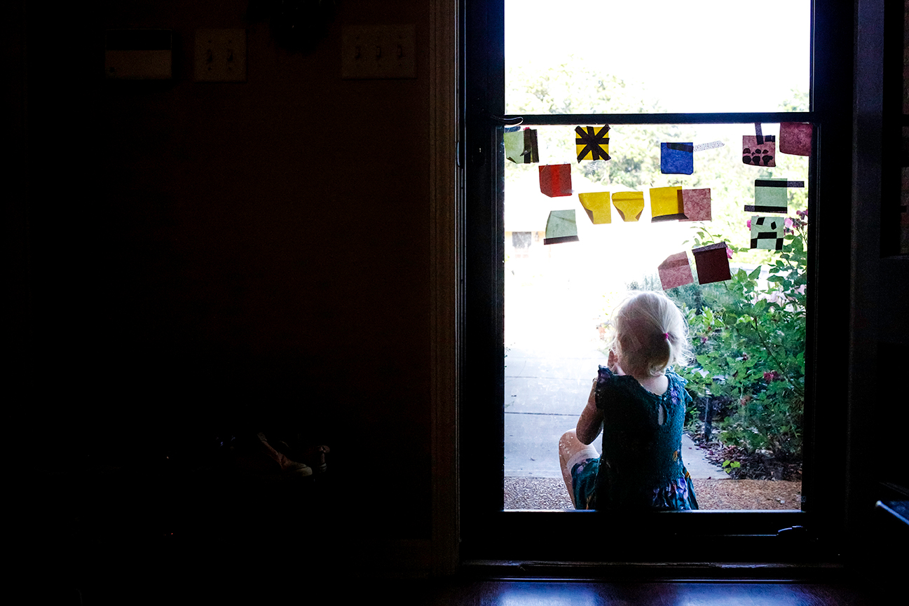 documentary-newborn-session-oxford-mississippi-girl-waiting-screen-door.jpg