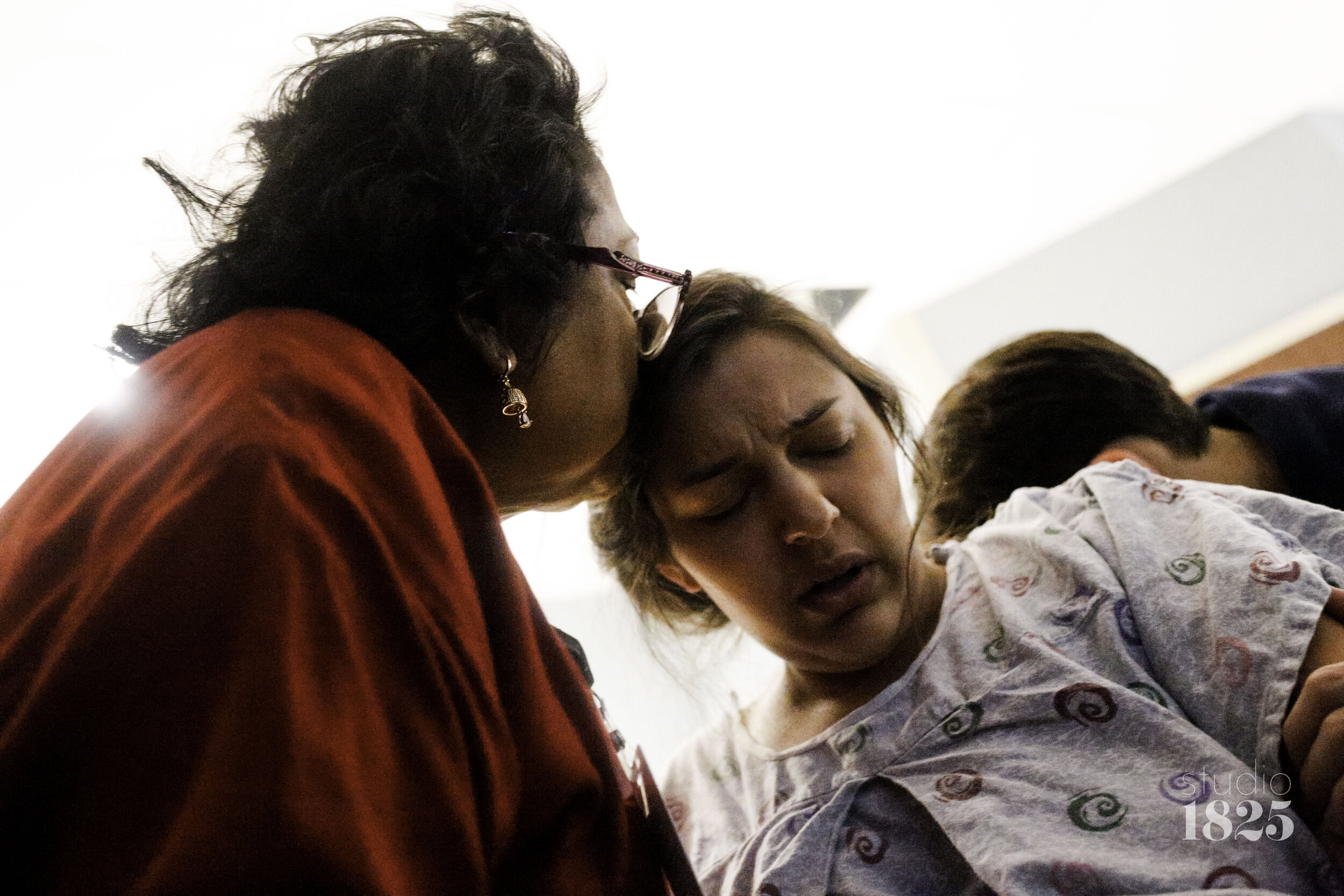 documentary-birth-photography-memphis-tn-grandmother-kissing-forehead.jpg
