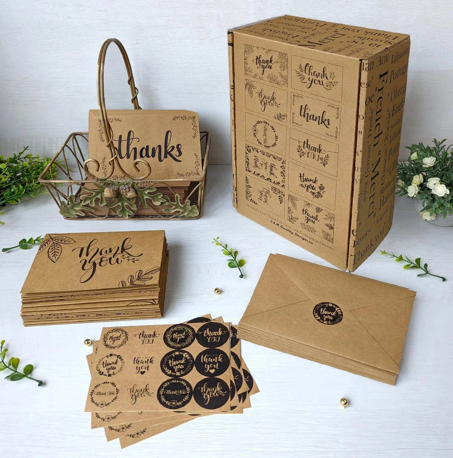 Box of T&M kraft thank you cards with envelopes and sealing stickers