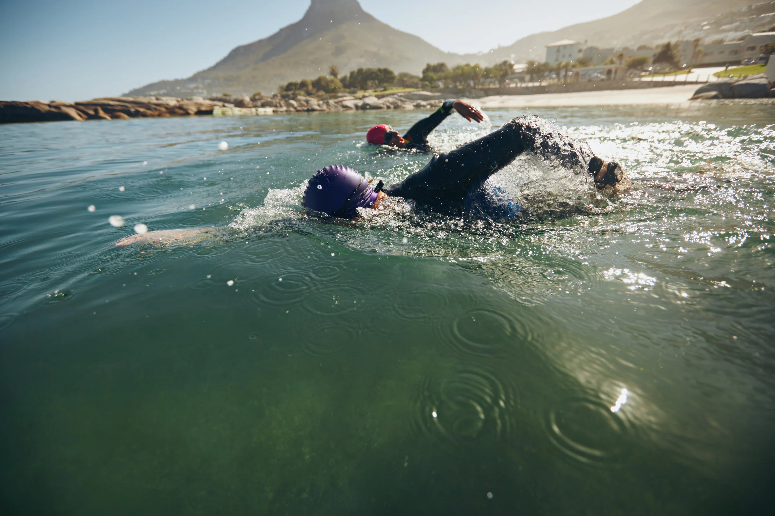 Canva - Athletes Practicing for Triathletic Race in Lake.jpg
