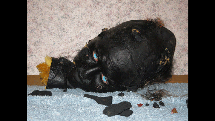 Self-portrait as Burned Chucky Head (GIF), 2015