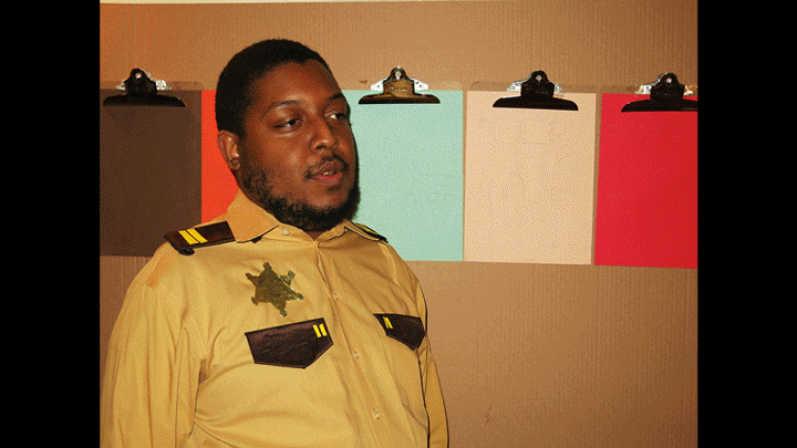 Self-portrait as Basketcase with police officer (GIF), 2015 