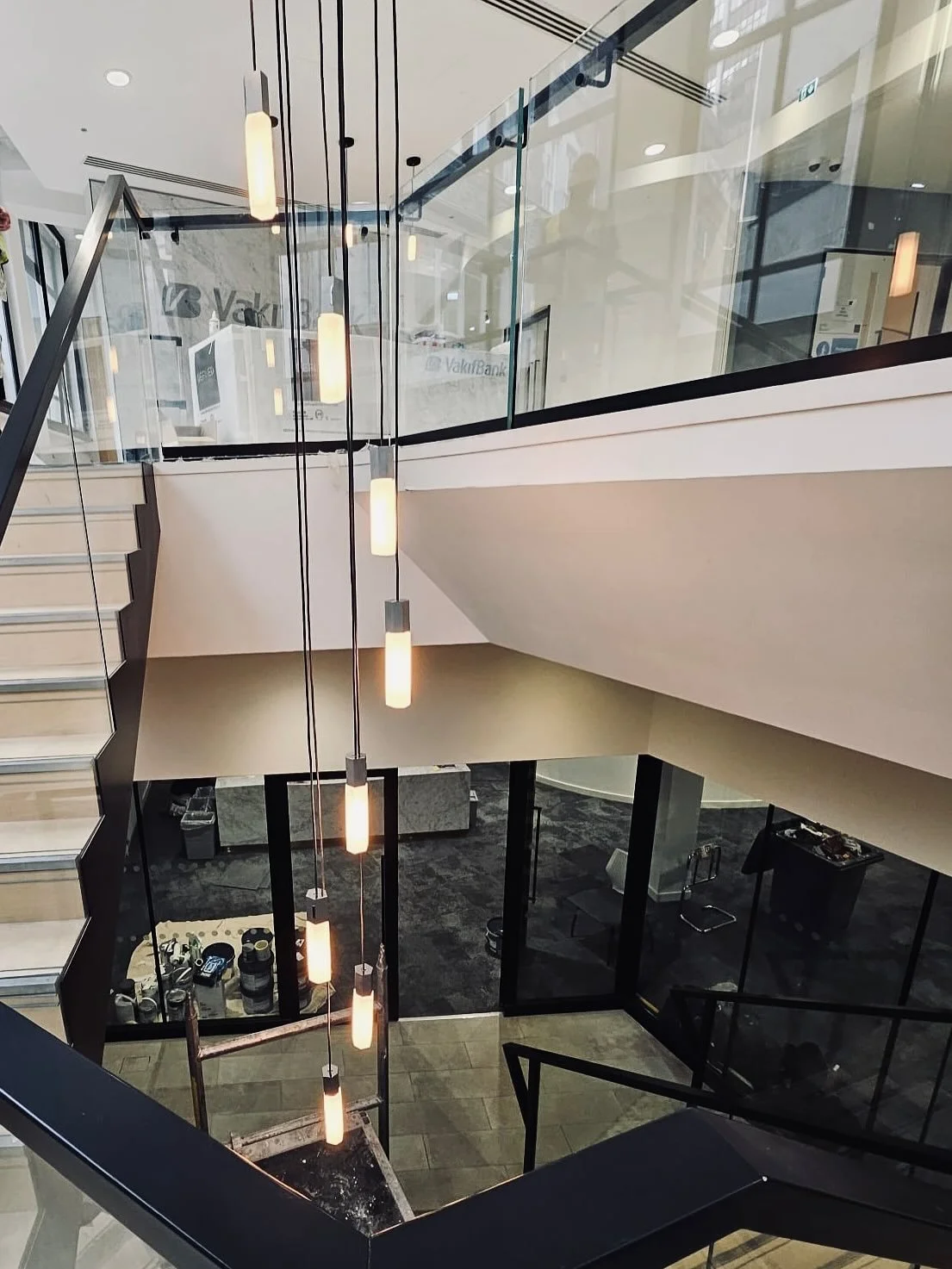 L I G H T I N G  M A G I C
 
Another sneaky peek into the lighting installations at our site on Lime Street on behalf of our client, Vakif Bank.
 
We&rsquo;re all about statement pieces that do more than just brighten a space, they draw the eye, set 