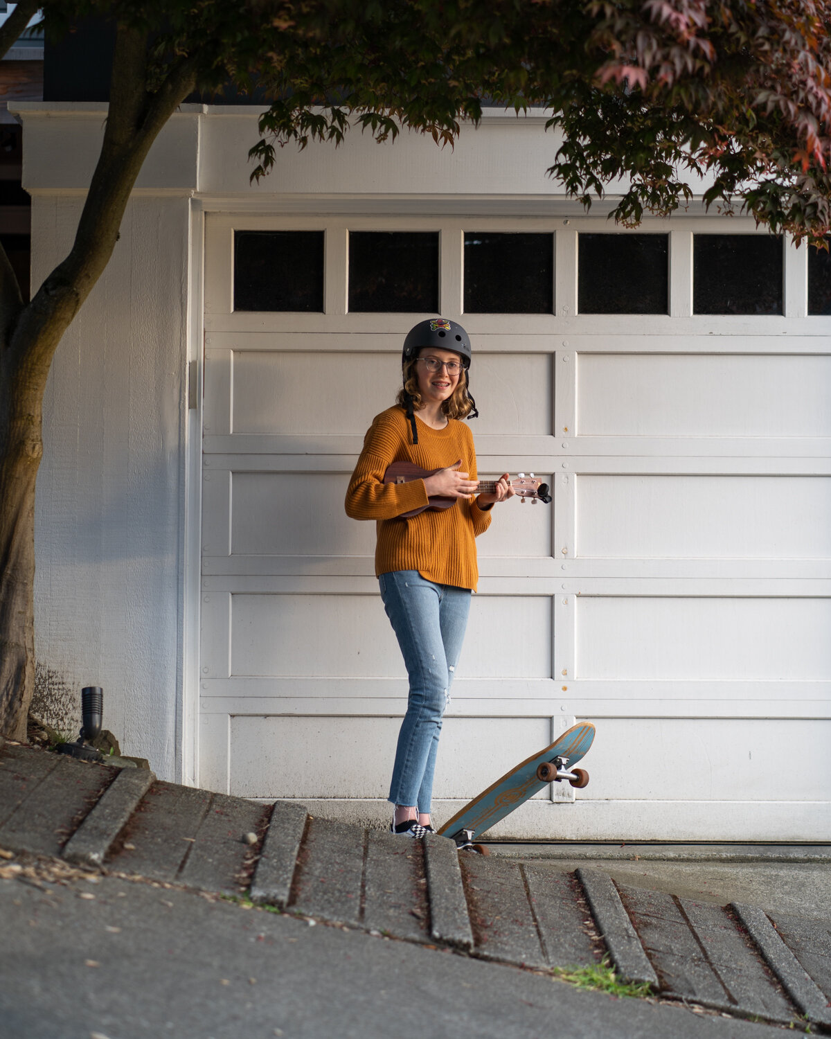 Erin with Her Ukulele and Skateboard