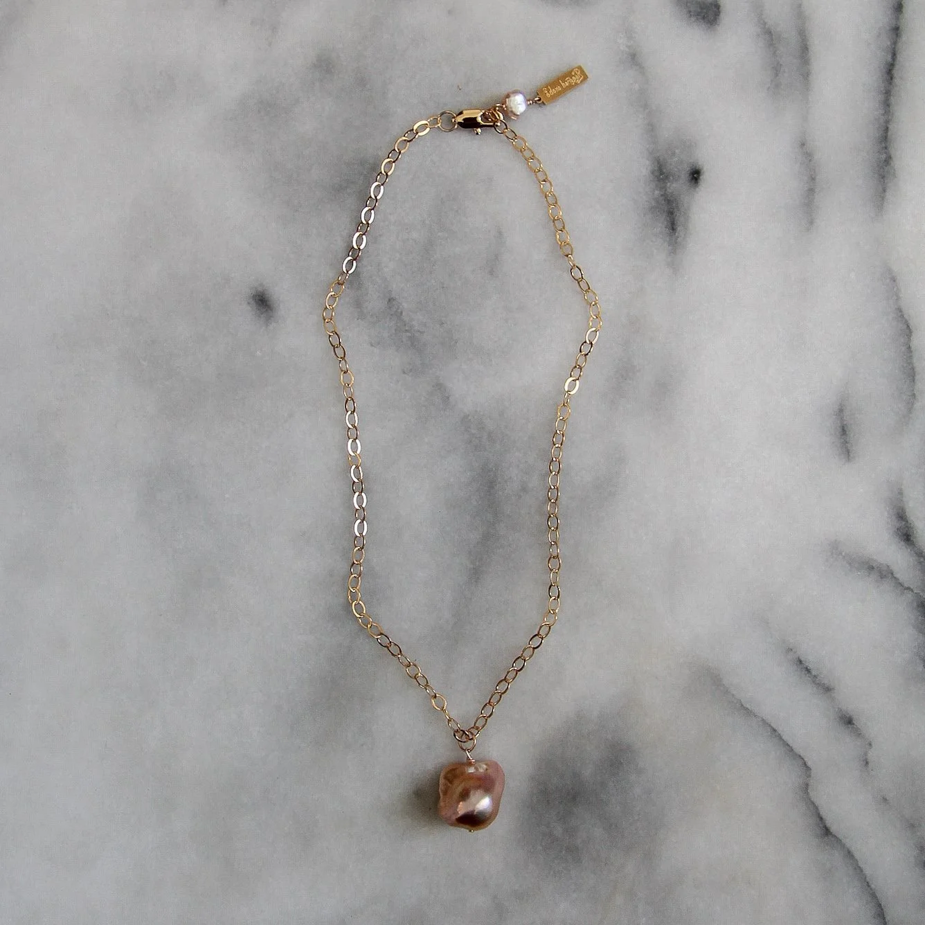 large pearl drop necklace in mauve