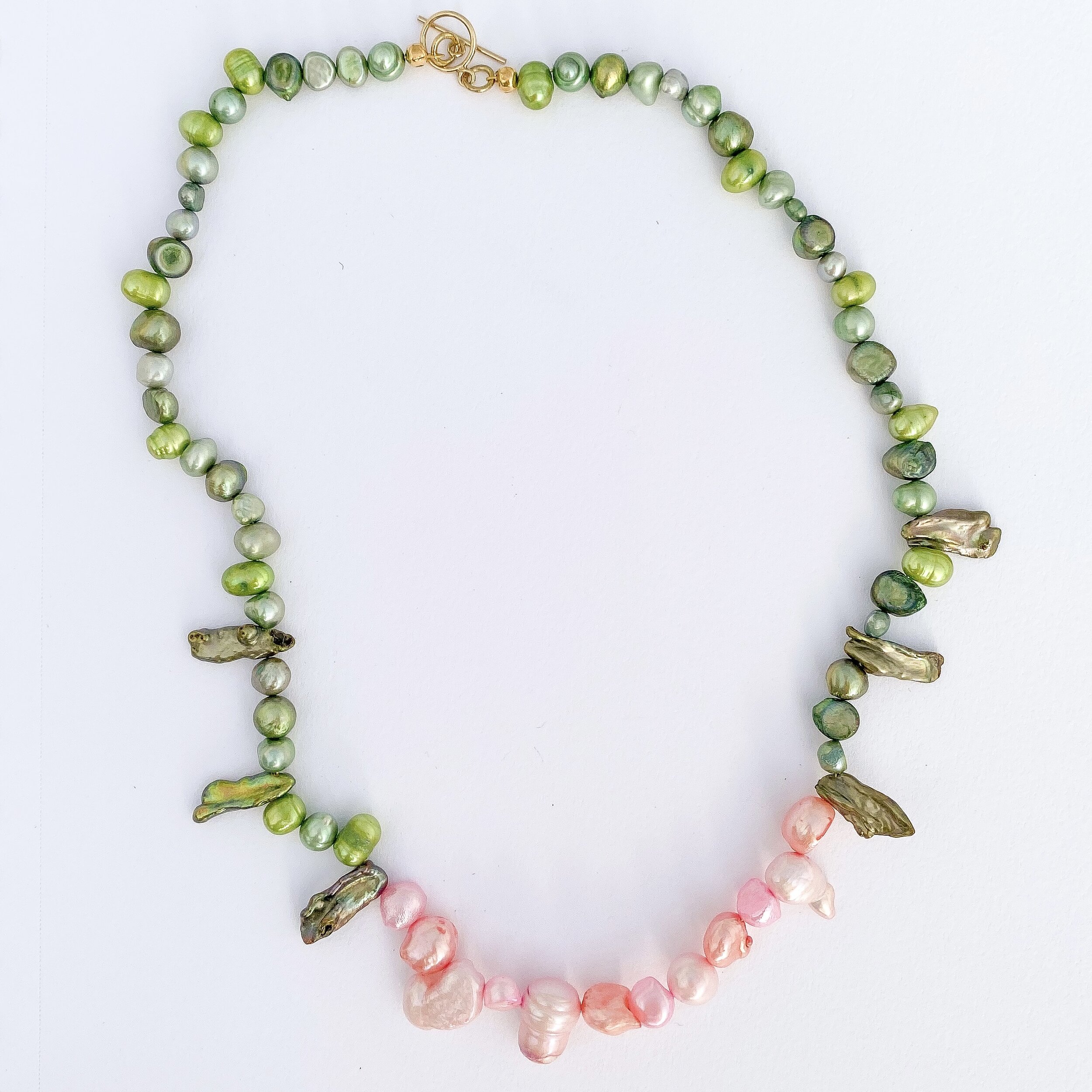  pink roses are given to show admiration of one’s refinement. pale pink ones are specifically for admiration, joy, or gentleness. i’ve been known to give myself a bouquet from time to time. freshwater pearls, gold-filled toggle clasp. 