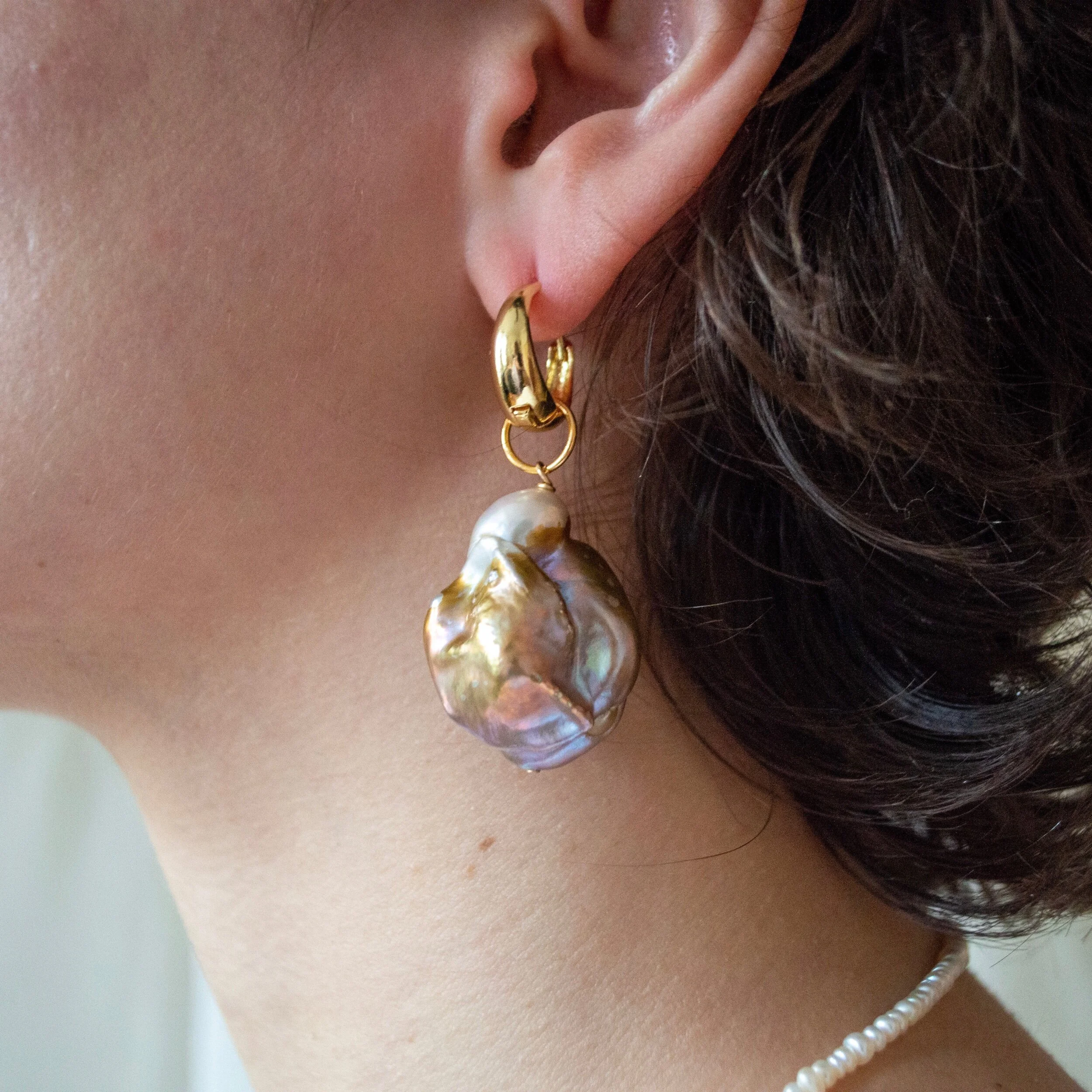 large pearl drop earrings in mauve