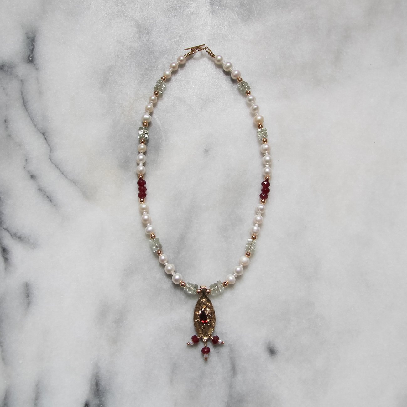 vulnus garnet necklace