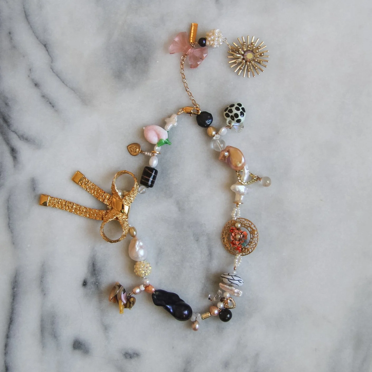 peach + gold bow on collab necklace.JPG