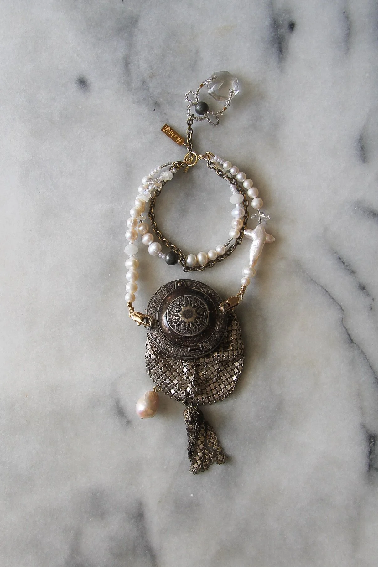 la femme moderne one-of-a-kind bracelet & wristlet