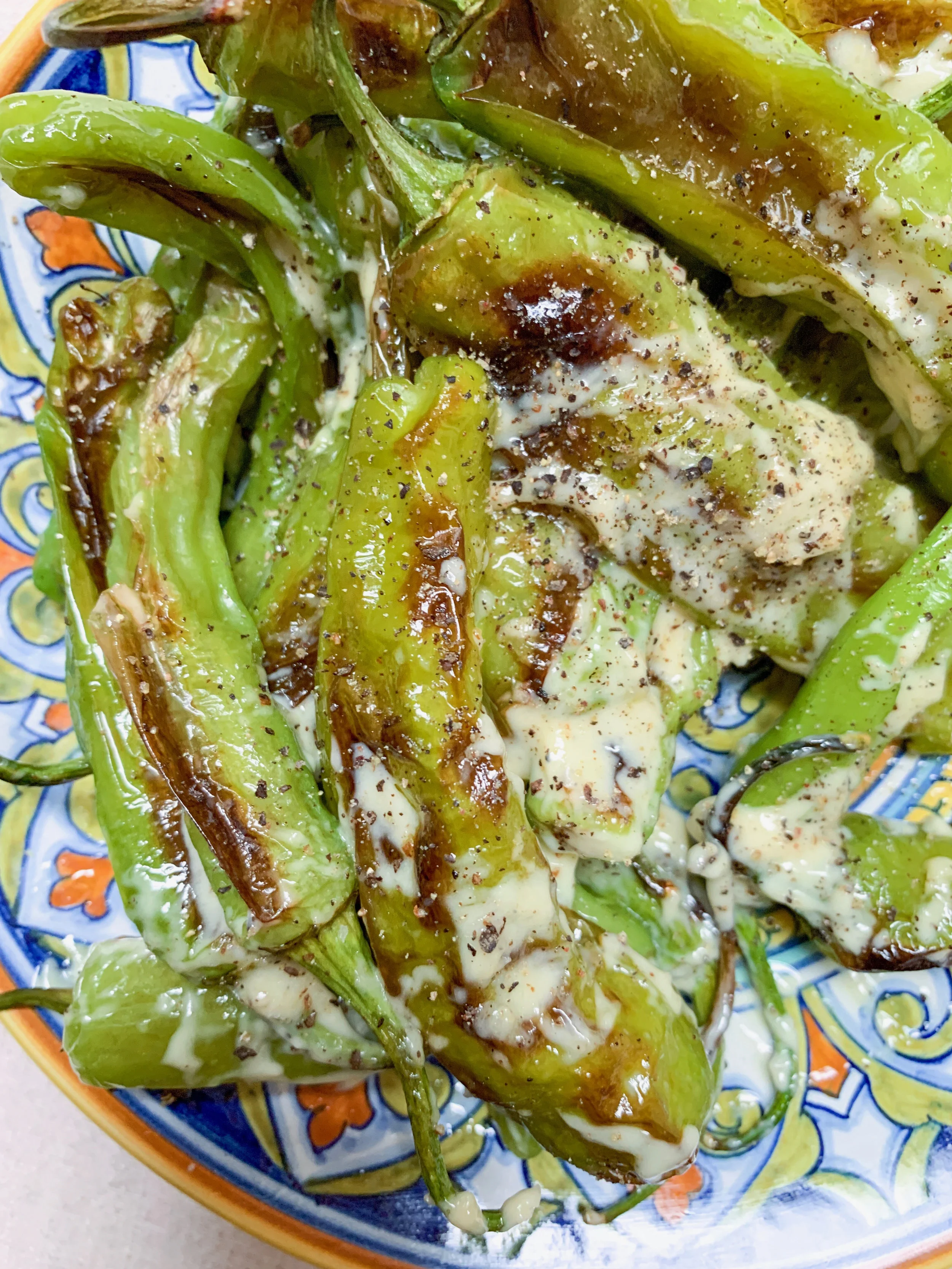 Caesar Tossed Charred Shishito Peppers