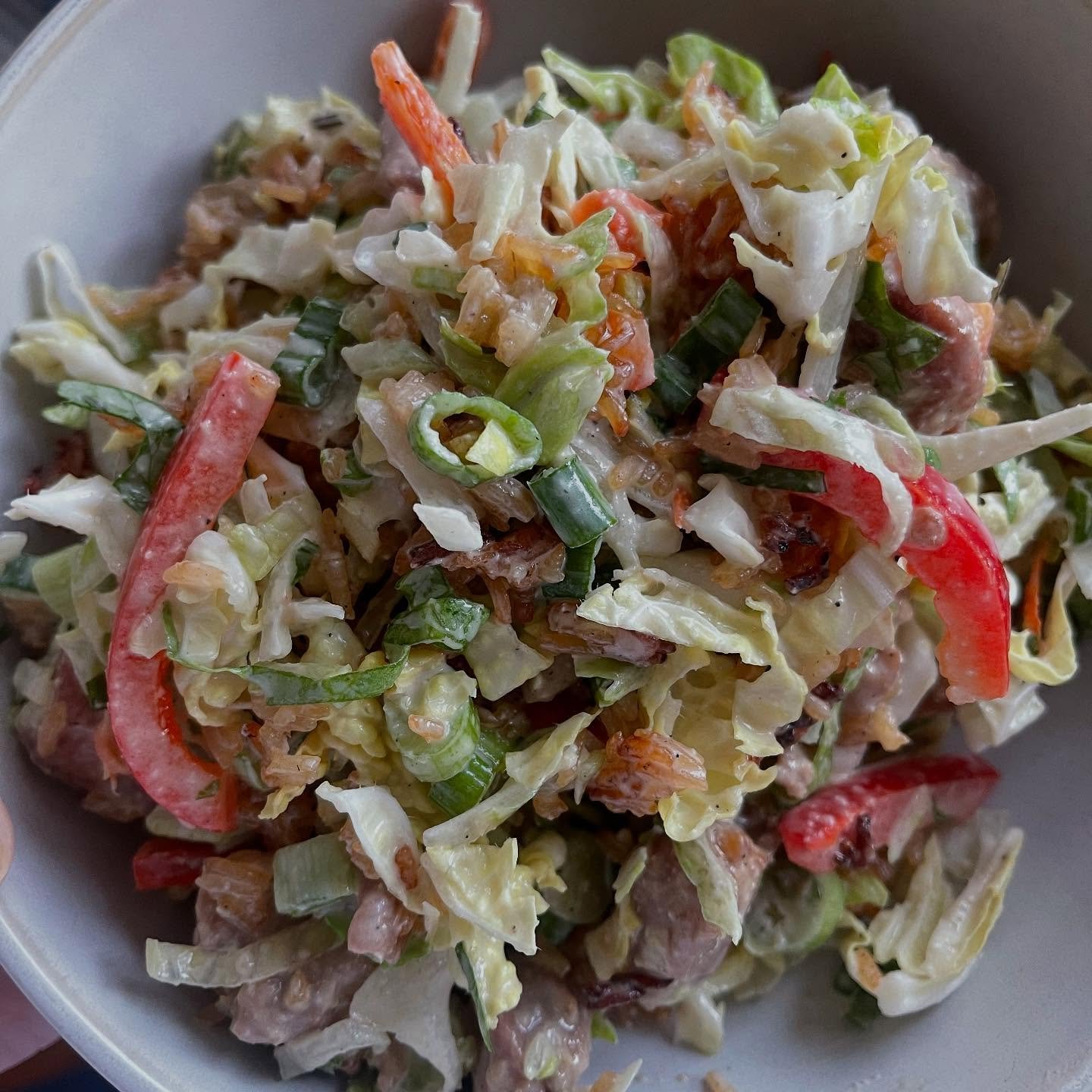 Ginger Sesame Lime Dressing, recipe by request&hellip; You can make any Asian-inspired salad super delicious with this dressing. This Napa cabbage slaw has teriyaki chicken, red bell pepper, crispy rice, green onion, cilantro, and the best dressing e