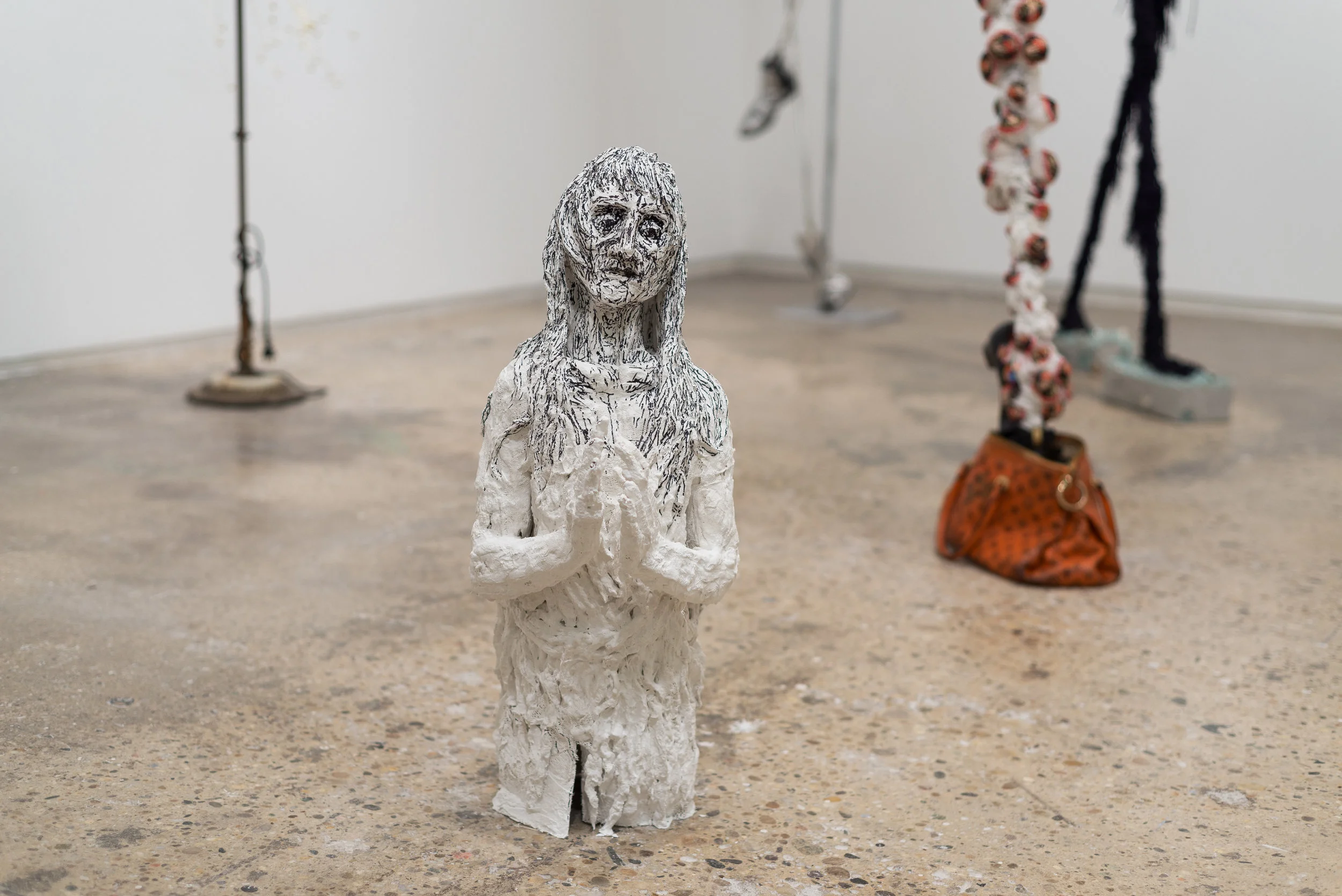 Magdalene , 2018. Plaster bandages, sharpie.