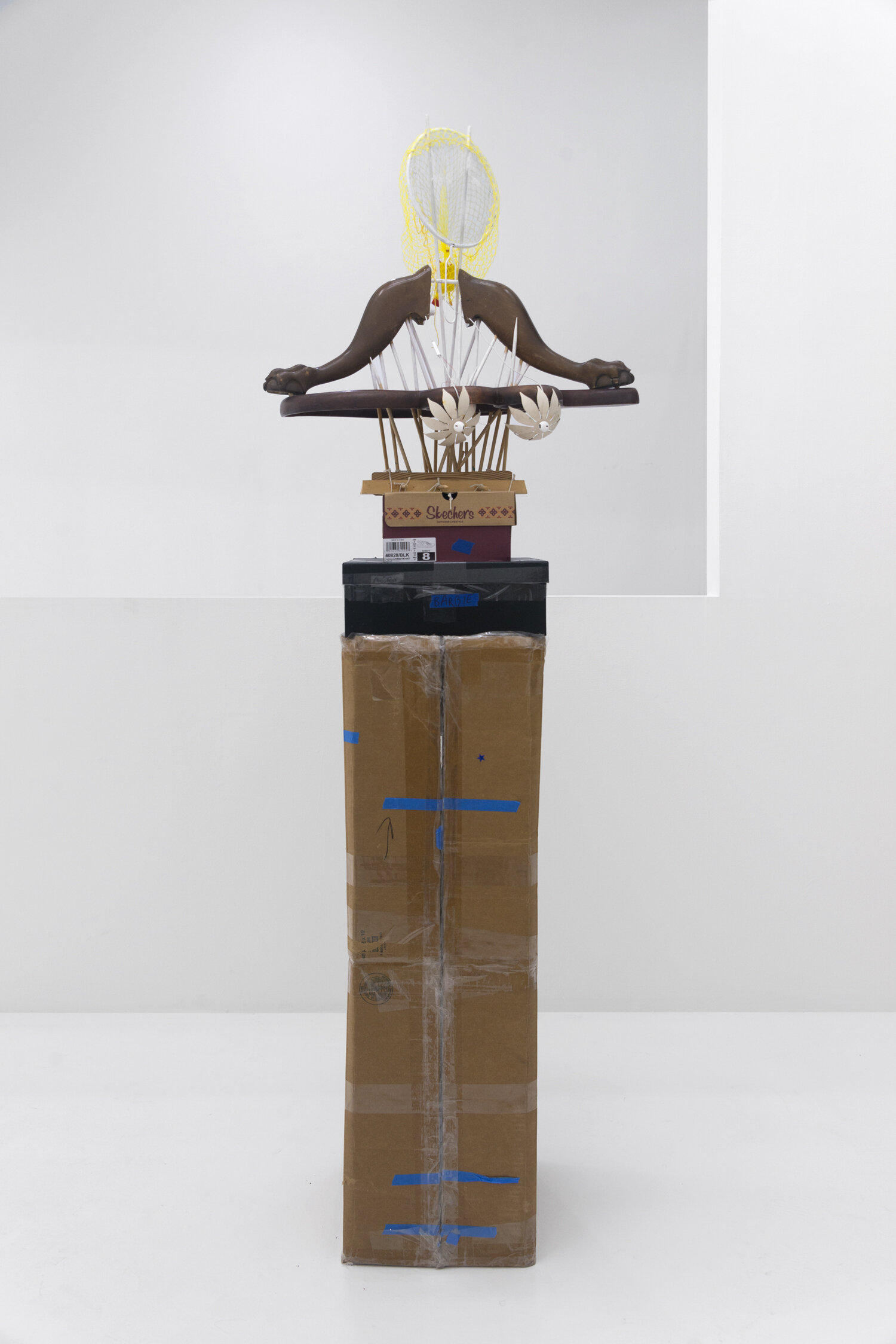   Bertha , 2019. Wood, metal, bamboo, plastic, rubber, acrylic paint, cotton thread. Pedestal: cardboard, cotton twine. 