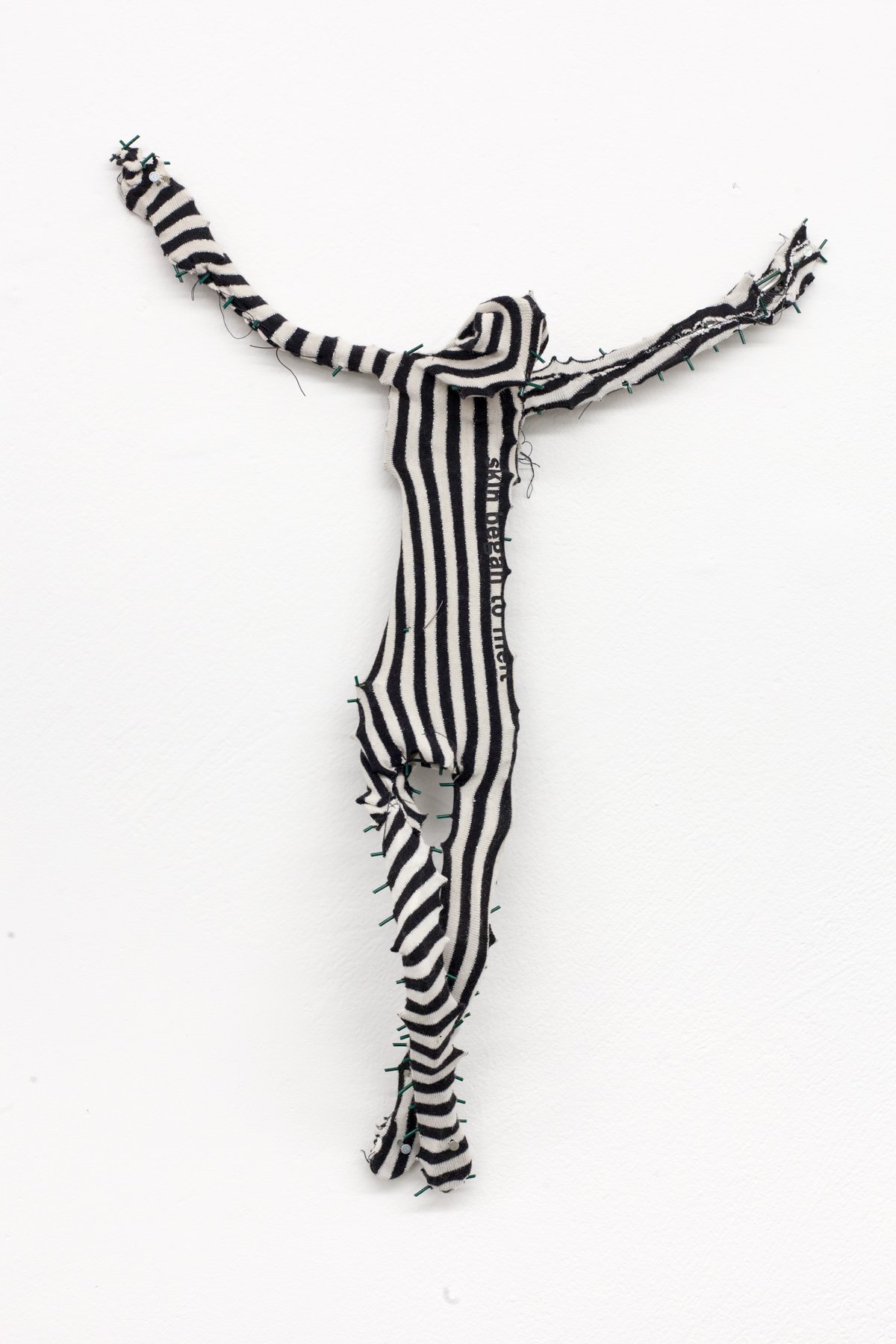   Bikini Crucifixion no. 3 , 2020. Old bathingsuits, steel, cotton thread. 16 x 12 x 2.5 inches. 