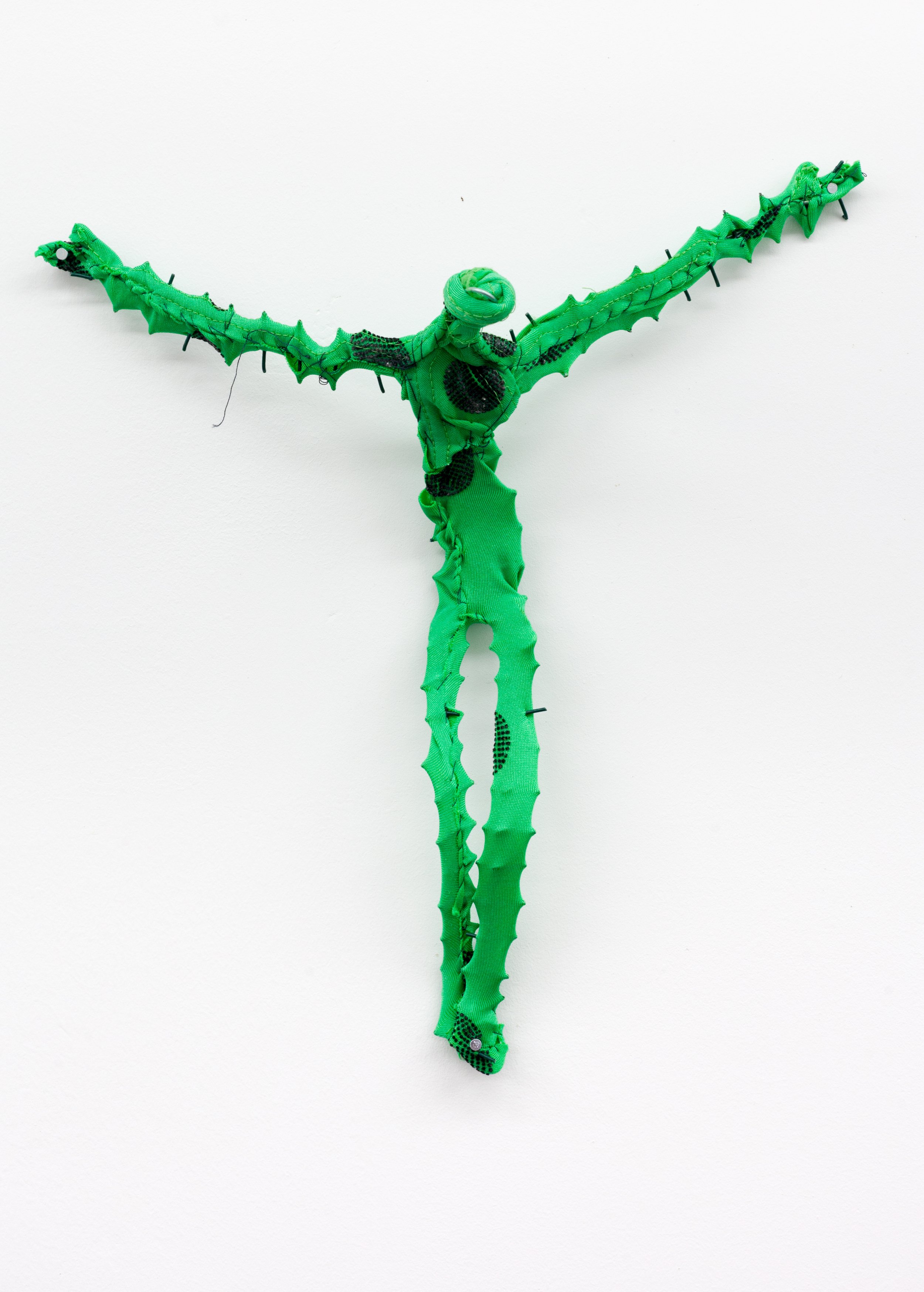   Bikini Crucifixion no. 1 , 2020. Old bathingsuits, steel, cotton thread. 11 x 11 x 3 inches. 