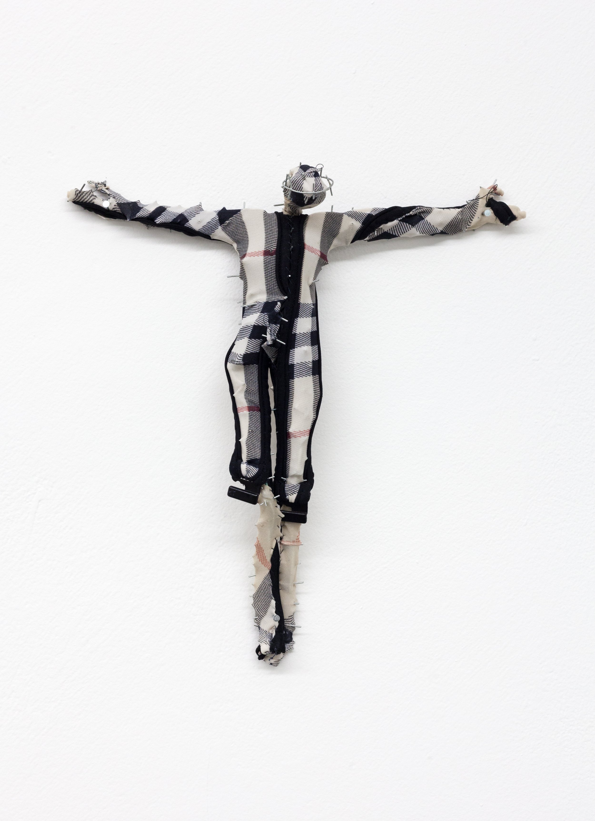  Bikini Crucifixion no. 11 , 2020. Old bathingsuits, steel, cotton thread. 11 x 11 x 2.5 inches. 