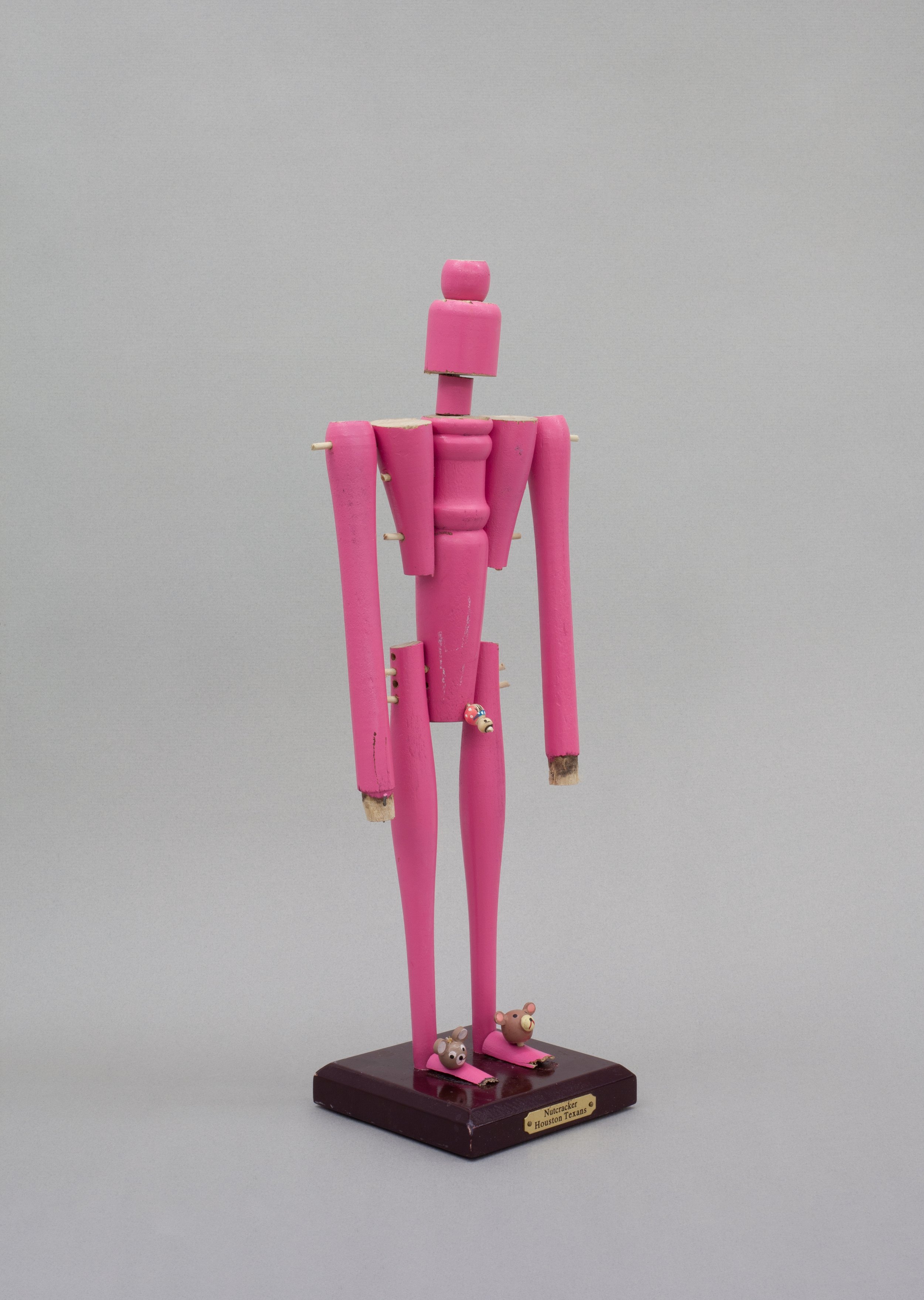   Jina (pink) , 2022. Wood, paint, metal. 16 x 5 x 4 in 