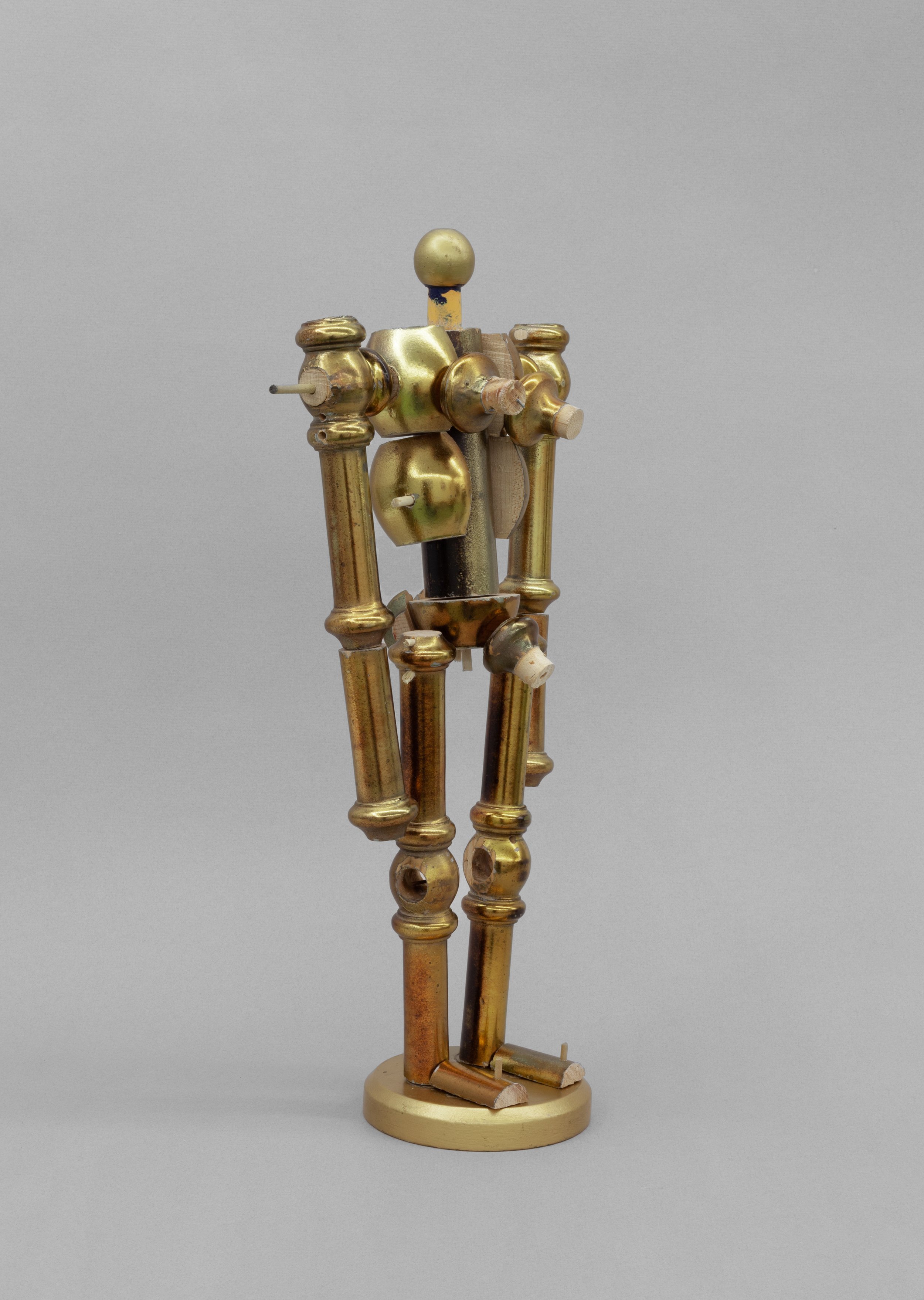   Jina (brass) , 2023. Wood, paint. 16 x 8 x 4 in 