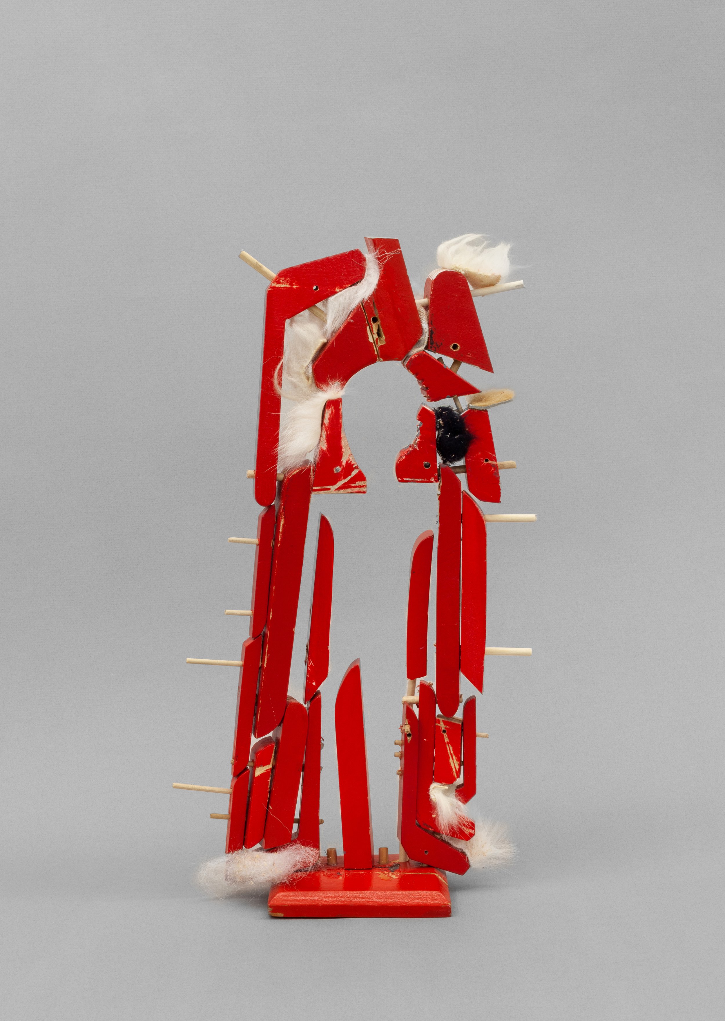   Released Spirit (red) , 2022. Wood, paint, faux fur. 15 x 8 x 3 in 