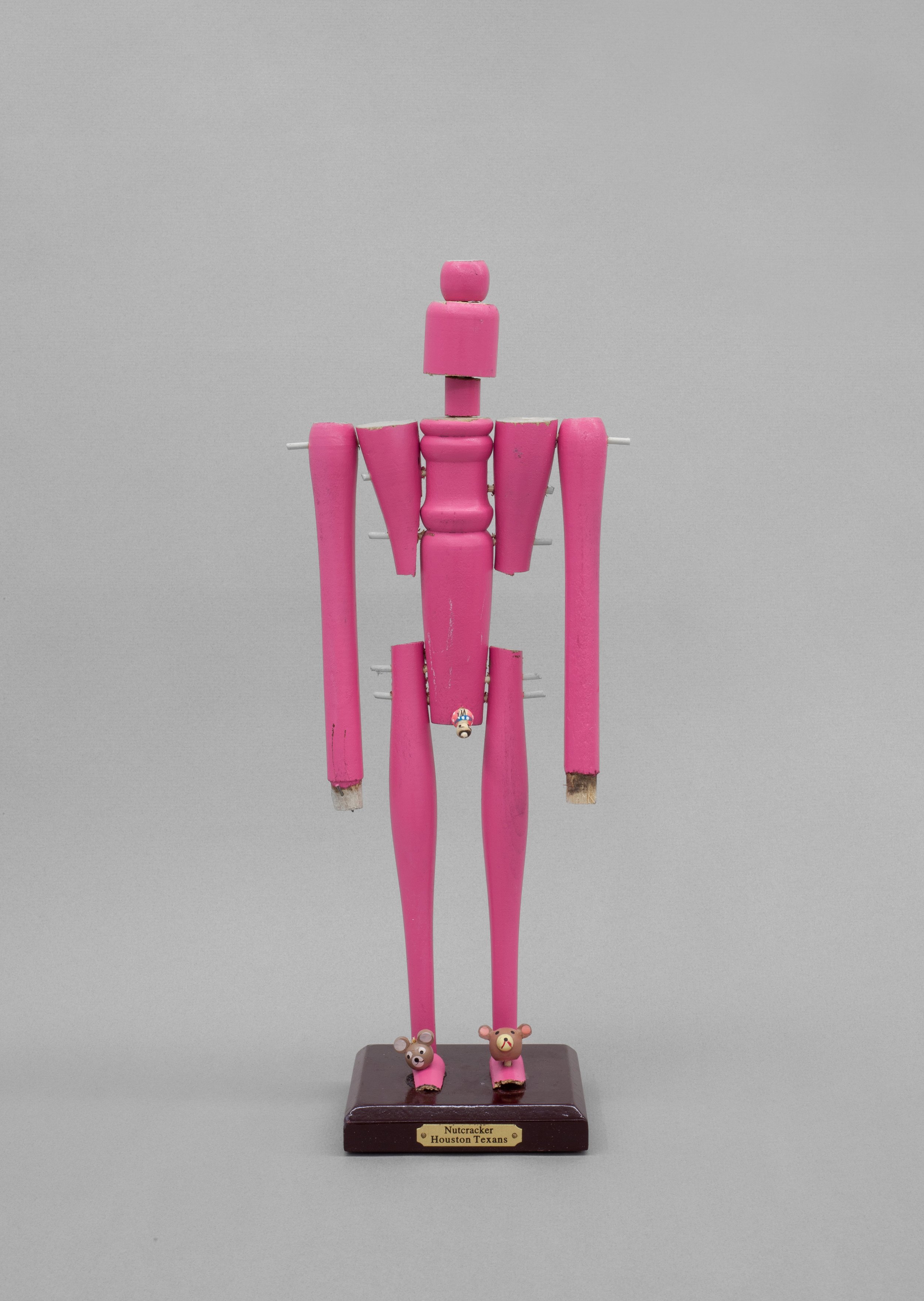   Jina (pink) , 2022. Wood, paint, metal. 16 x 5 x 4 in 