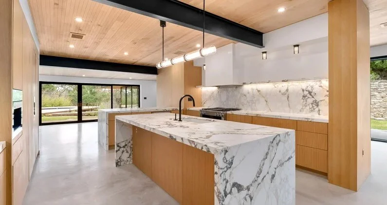 BEFORE and AFTER this kitchen with @blackdoveco_design interior design - notice how the ceiling was lifted to expose the steel beams