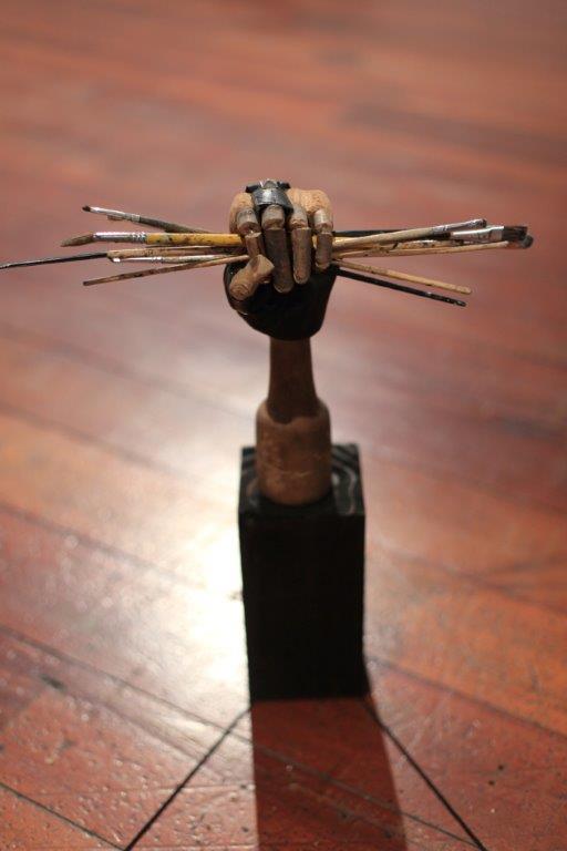 Seraphine, 2013, paint brushes, wood, customised glove, wood, cork, glue, wire, 370mm x 246mm x 80mm