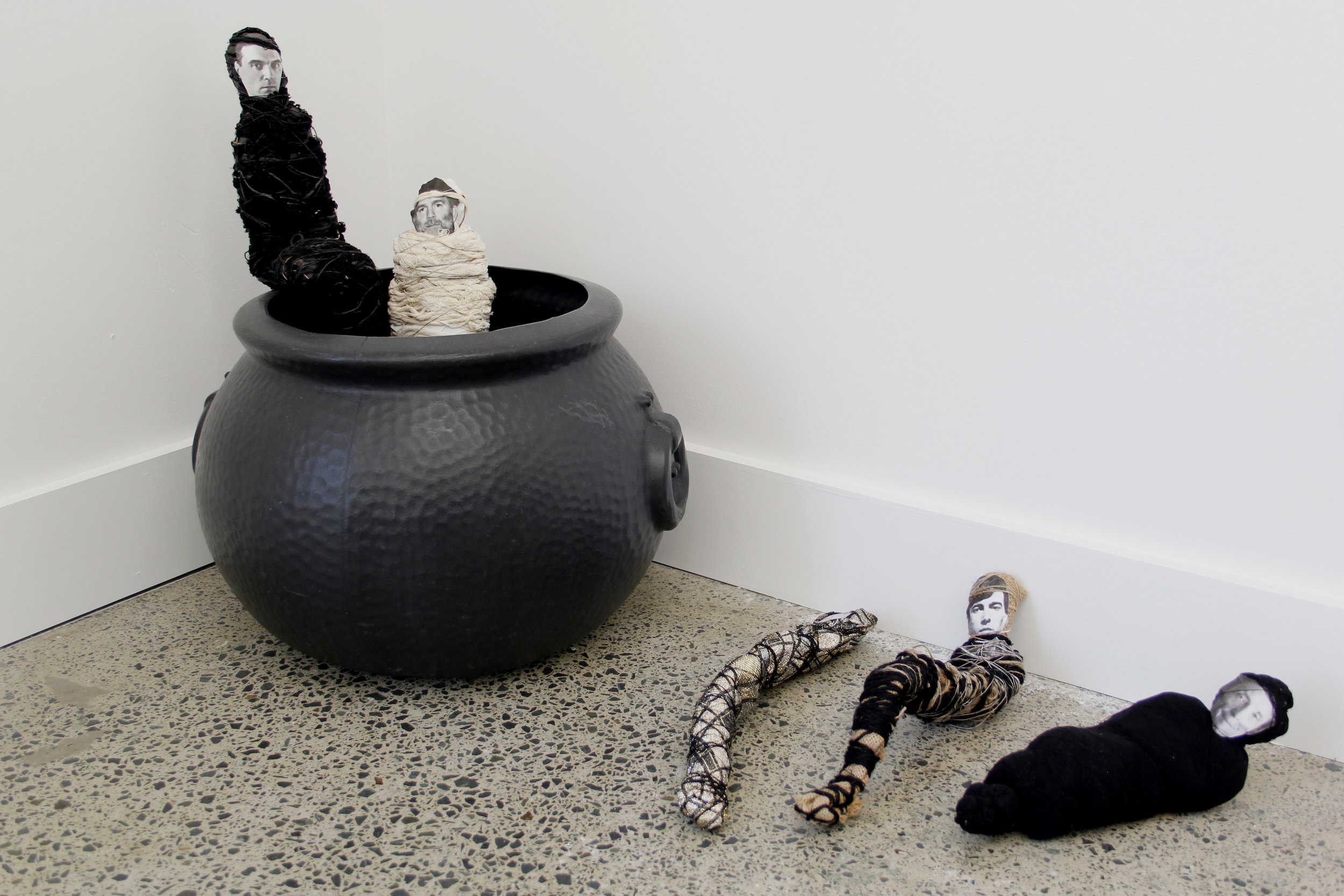   Spa Party/Rendering the Idols,  2013,   found plastic cauldron, wire, photocopied paper, plastic bags, pantyhose, string, fabric, metal. 