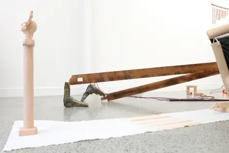  Installation view of  Hubris . 2024. Fired clay and  Natural Man . 2025. Anagama kiln fired clay, rimu and oak. Dimensions variable. 