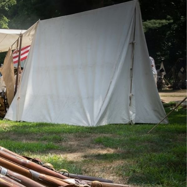 white canvas wedge tent at military reenactment