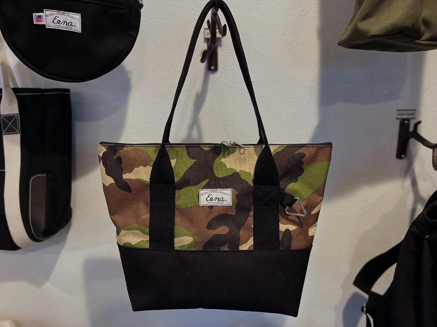 Our @sewingbyrory whipped up this camo tote for the season!  Complete with a handy internal pocket and outside key clip.  A handful more are on the way and will be available soon.  Who knows, maybe it will stay in the catalog for good.
.
.
.
#totebag
