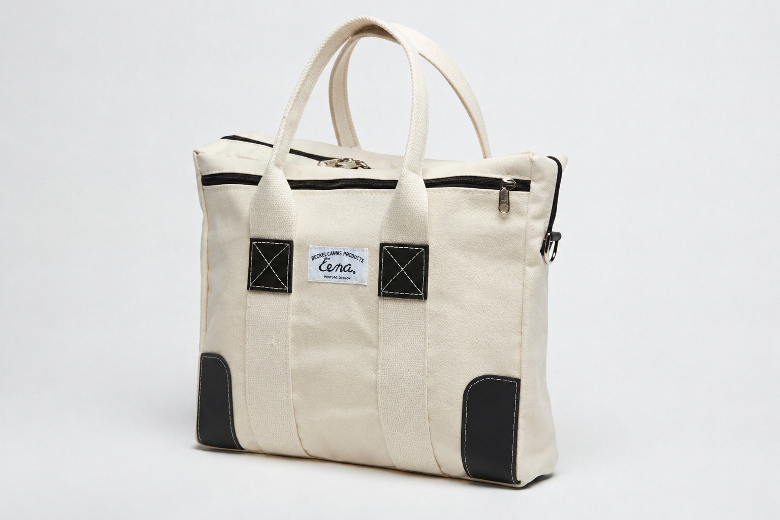 white canvas briefcase with black leather